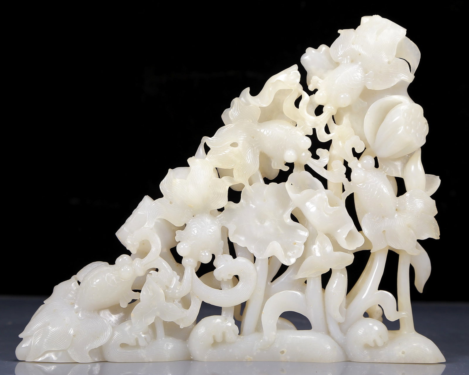 An Exquisite White Jade Lotus and Fish Pattern Ornament: An Exquisite White Jade Lotus and Fish Pattern Ornament,Qing Dynasty, China,Size:11inx1.8inx9.1in,Weight:1565g 白玉荷花金鱼摆件，清代