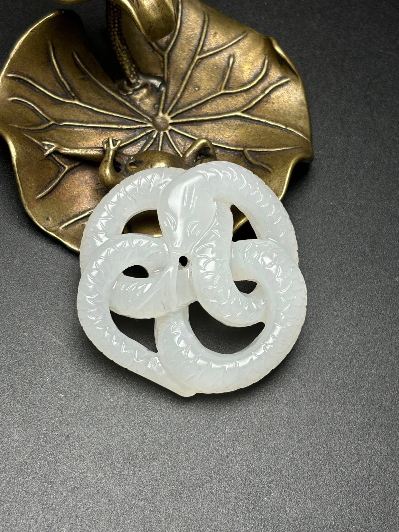 An Exquisite White Jade Snake Pendant (1 of 7)