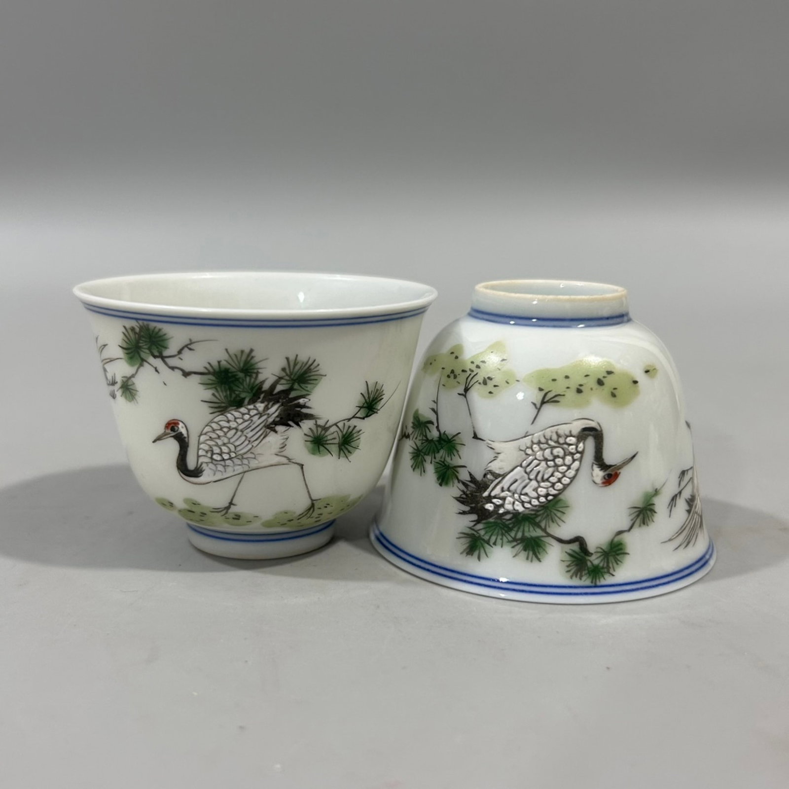 A Pair of Exquisite Pine and Crane Pattern Cups,With Poem: A Pair of Exquisite Pine and Crane Pattern Cups,With Poem,Qing Dynasty,China,Yongzheng Six-character Mark,Size:2.8inx2in 一对松鹤纹杯,带诗文,È