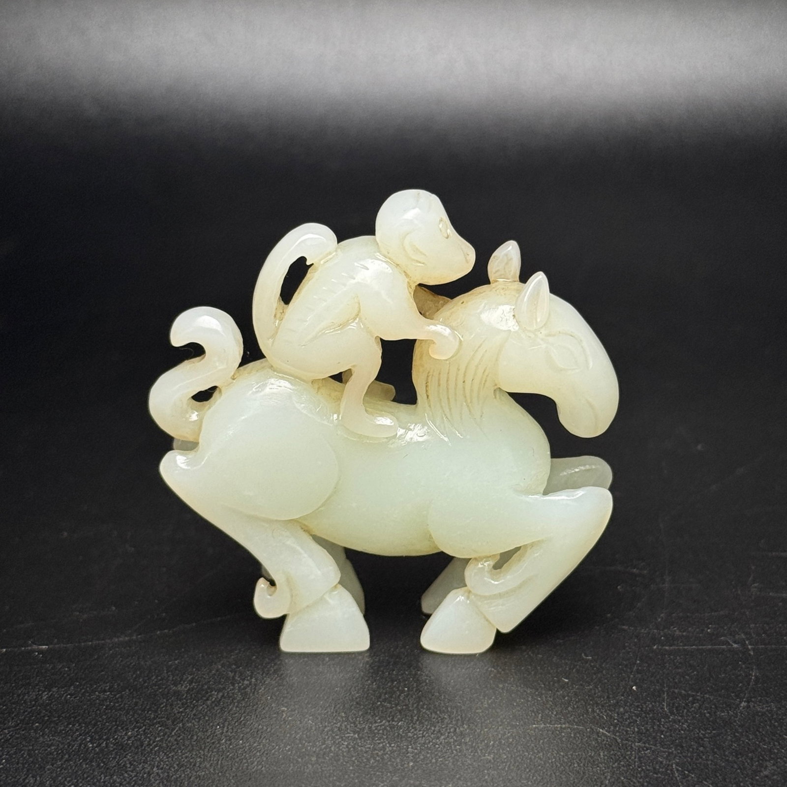 An Exquisite White Jade Monkey Horse Ornament (1 of 7)