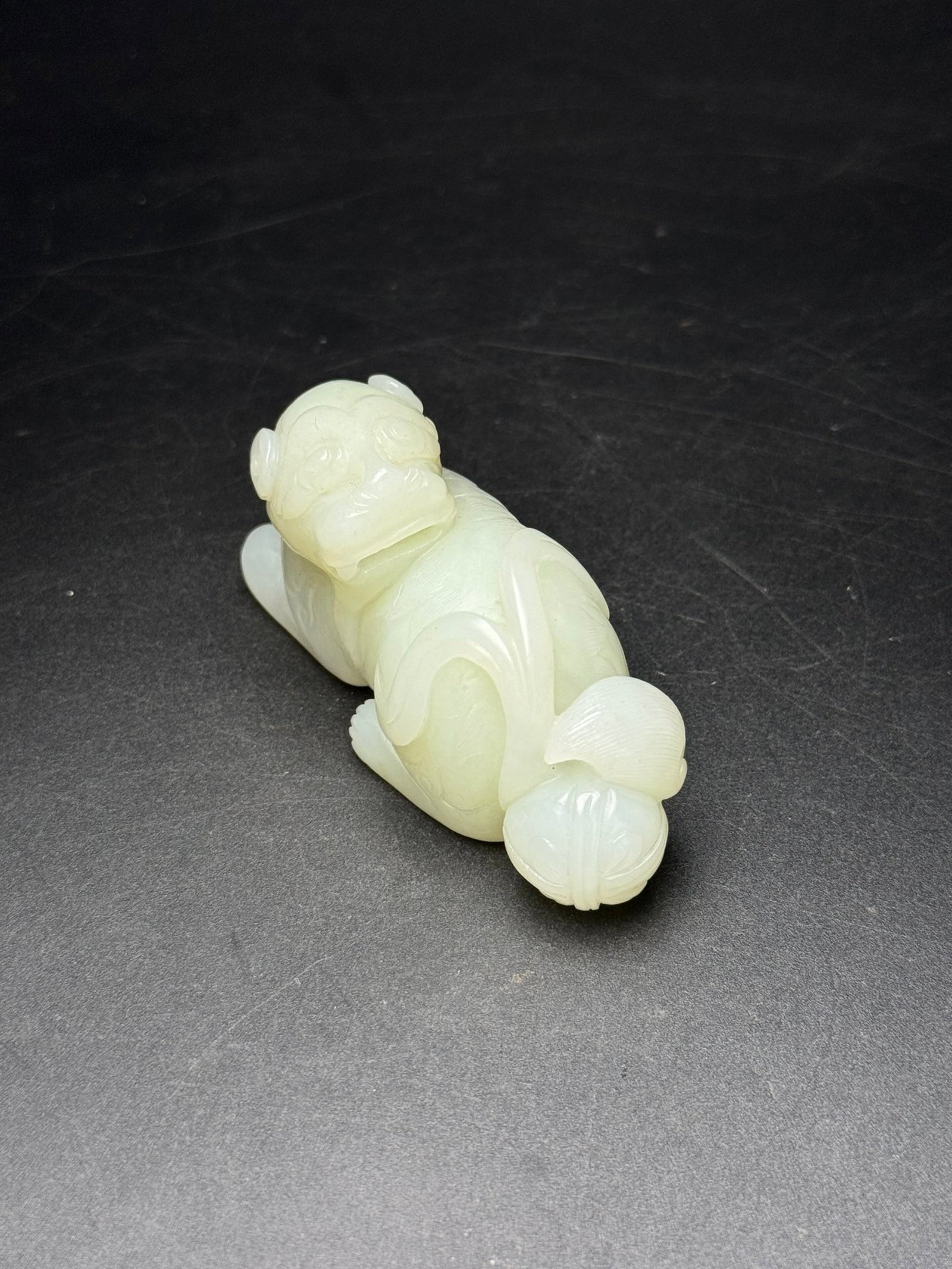An Exquisite White Jade Lion Hand Piece: An Exquisite White Jade Lion Hand Piece,Qing Dynasty,China,Size:77mmx39mmx31mm,Weight:120g 白玉狮子手把件,中国清代