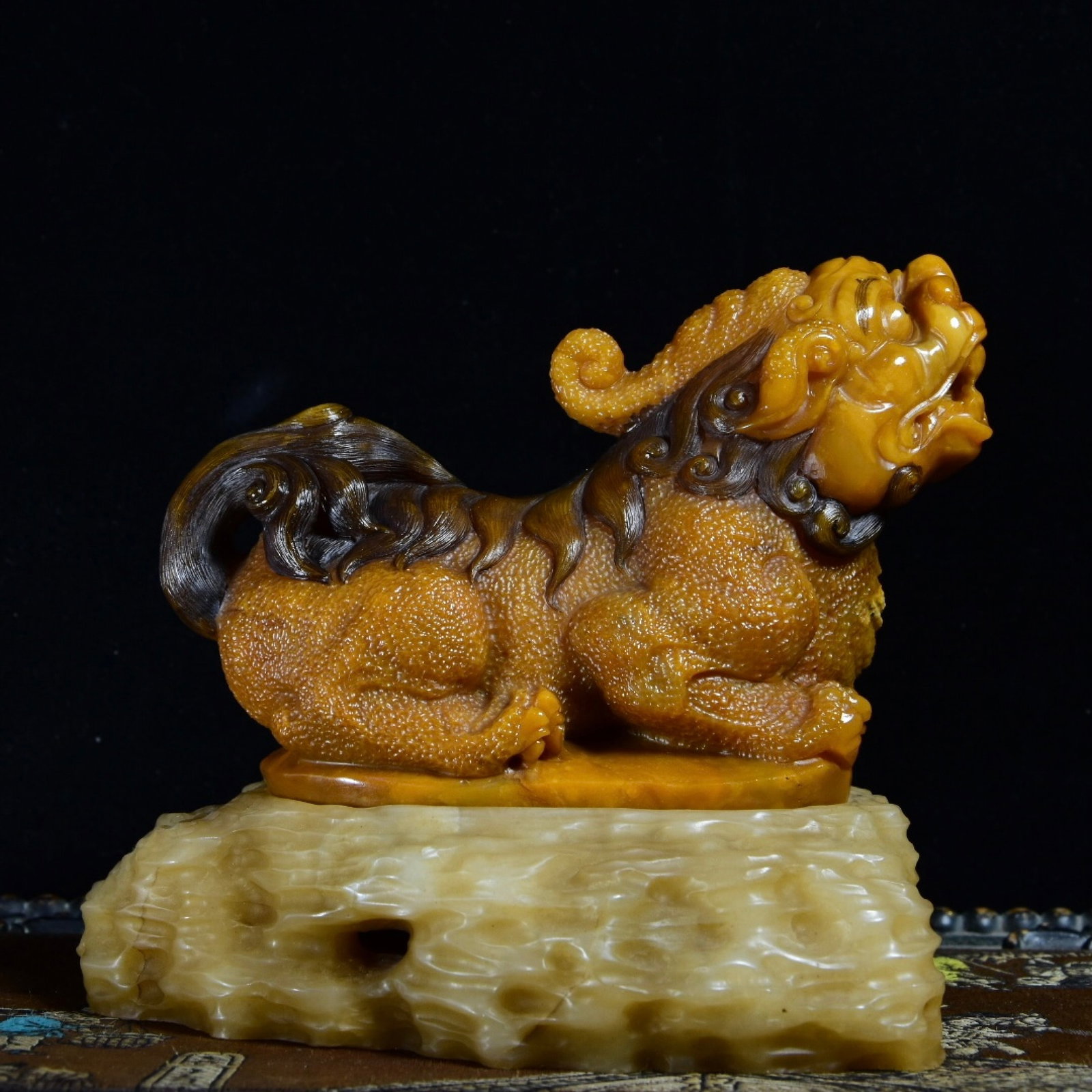 An Exquisite Tianhuang Stone Auspicious Beast Ornament,With Base: An Exquisite Tianhuang Stone Auspicious Beast Ornament,With Base,Qing Dynasty,China,Size:4.8inx5.7inx4in,Weight:1261.6g 田黄石瑞兽摆件,带底座