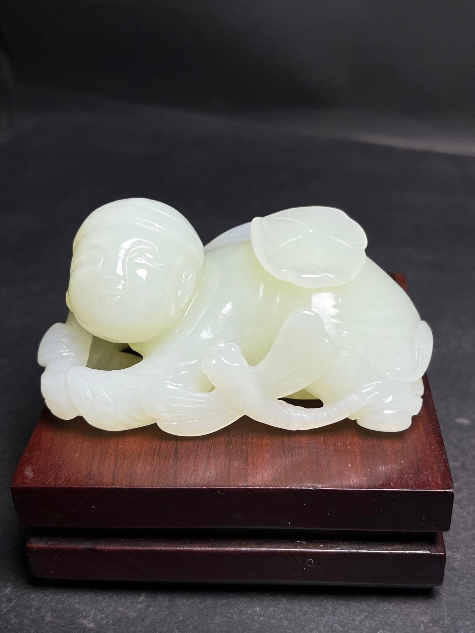 An Exquisite White Jade Figure Hand Piece: An Exquisite White Jade Figure Hand Piece,Qing Dynasty,China,Size:79mmx39mmx41mm,Weight:175g 白玉人物手把件,中国清代