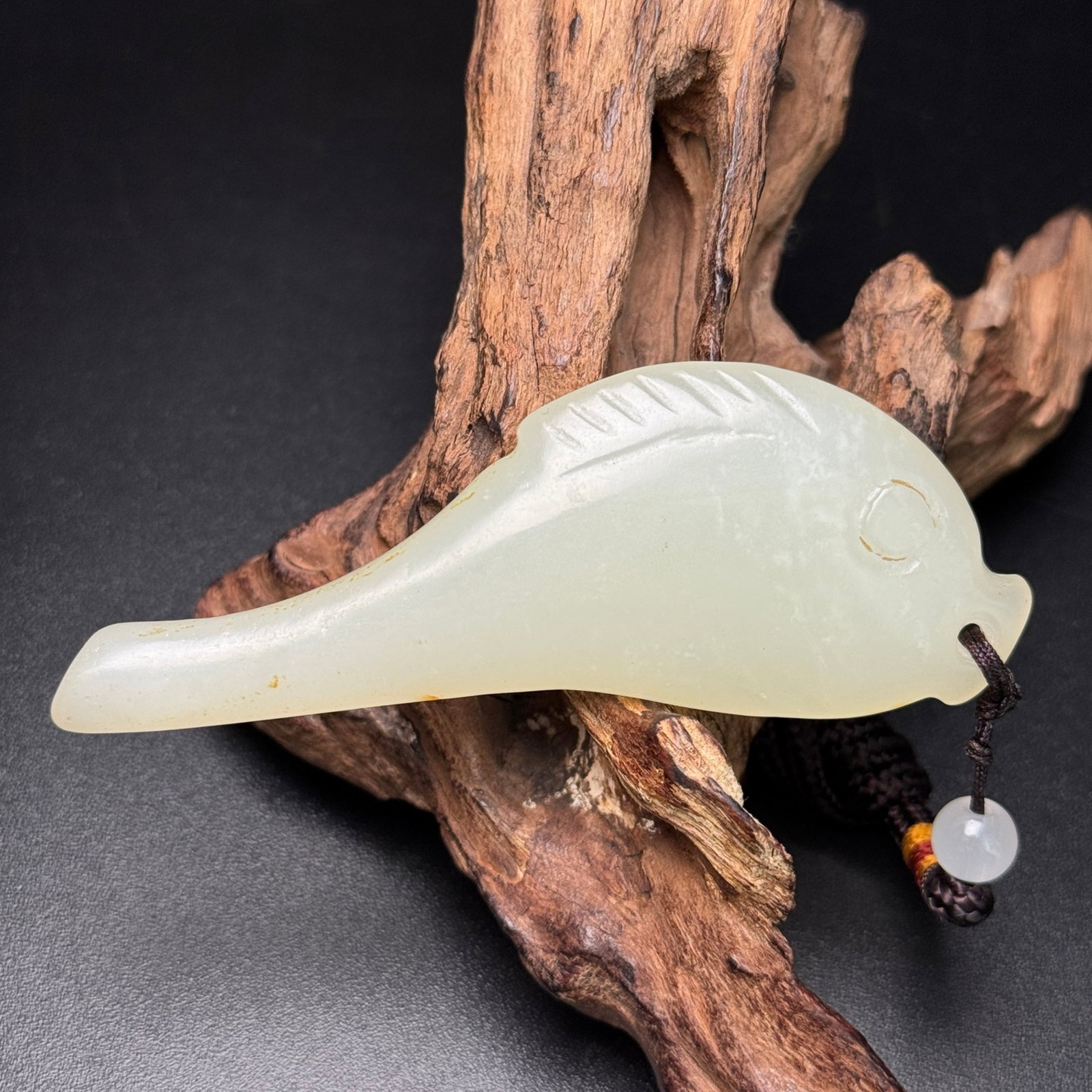 An Exquisite White Jade Fish Pendant: An Exquisite White Jade Fish Pendant,Qing Dynasty,China,Size:89mmx32mmx11mm,Weight:41g 白玉鱼挂件,中国清代