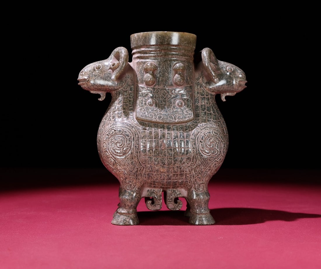An Exquisite Archaic Jade Sheep-Shaped Cup: An Exquisite Archaic Jade Sheep-Shaped Cup,Ancient Time,China,Size:168mmx155mmx68mm,Weight:1343g 高古玉羊形杯,中国远古时期
