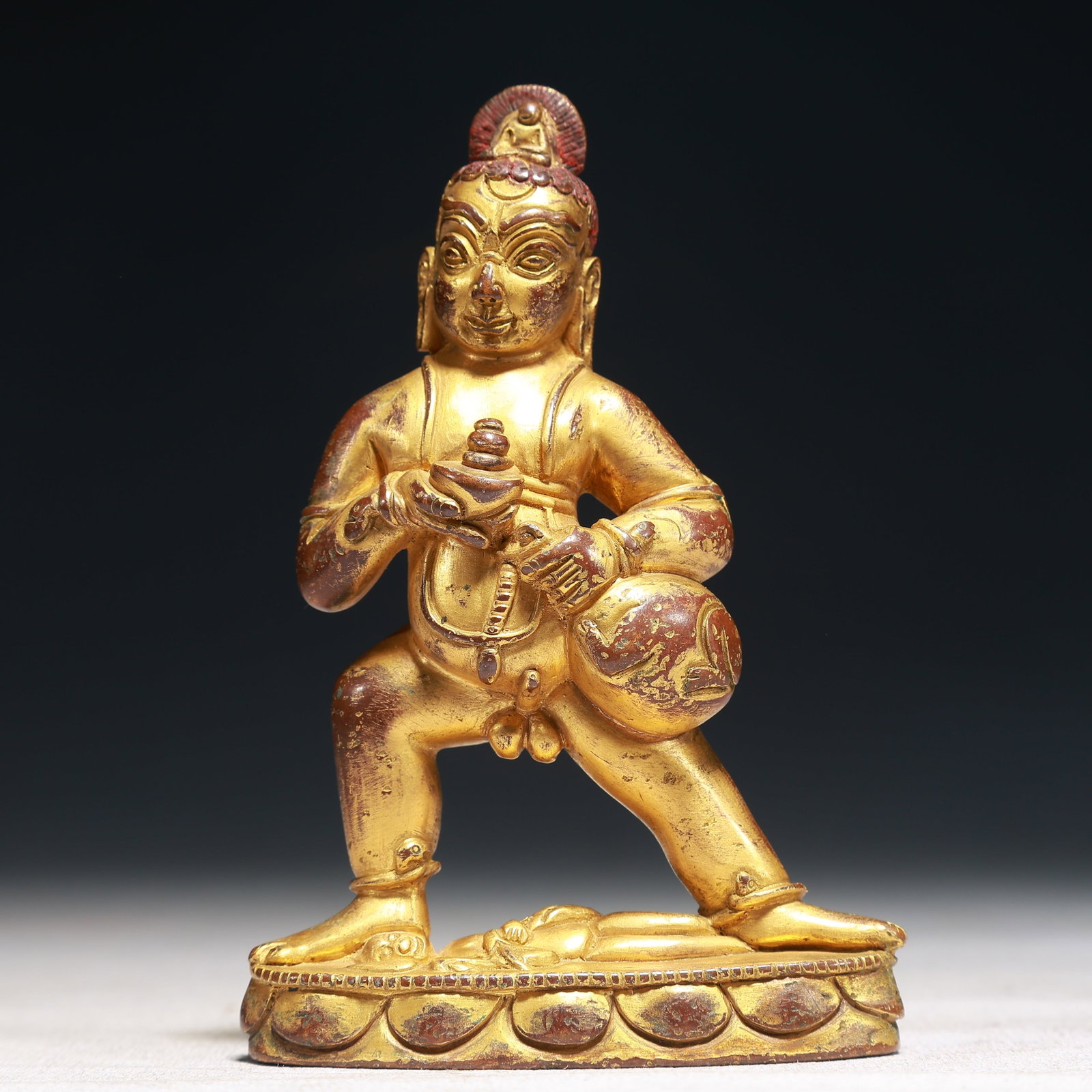 A Solemn Gilt Bronze Statue of Mammon: A Solemn Gilt Bronze Statue of Mammon,Qing Dynasty,China,Size:2.8inx1inx4.3in,Weight:350g 铜鎏金财神像,中国清代