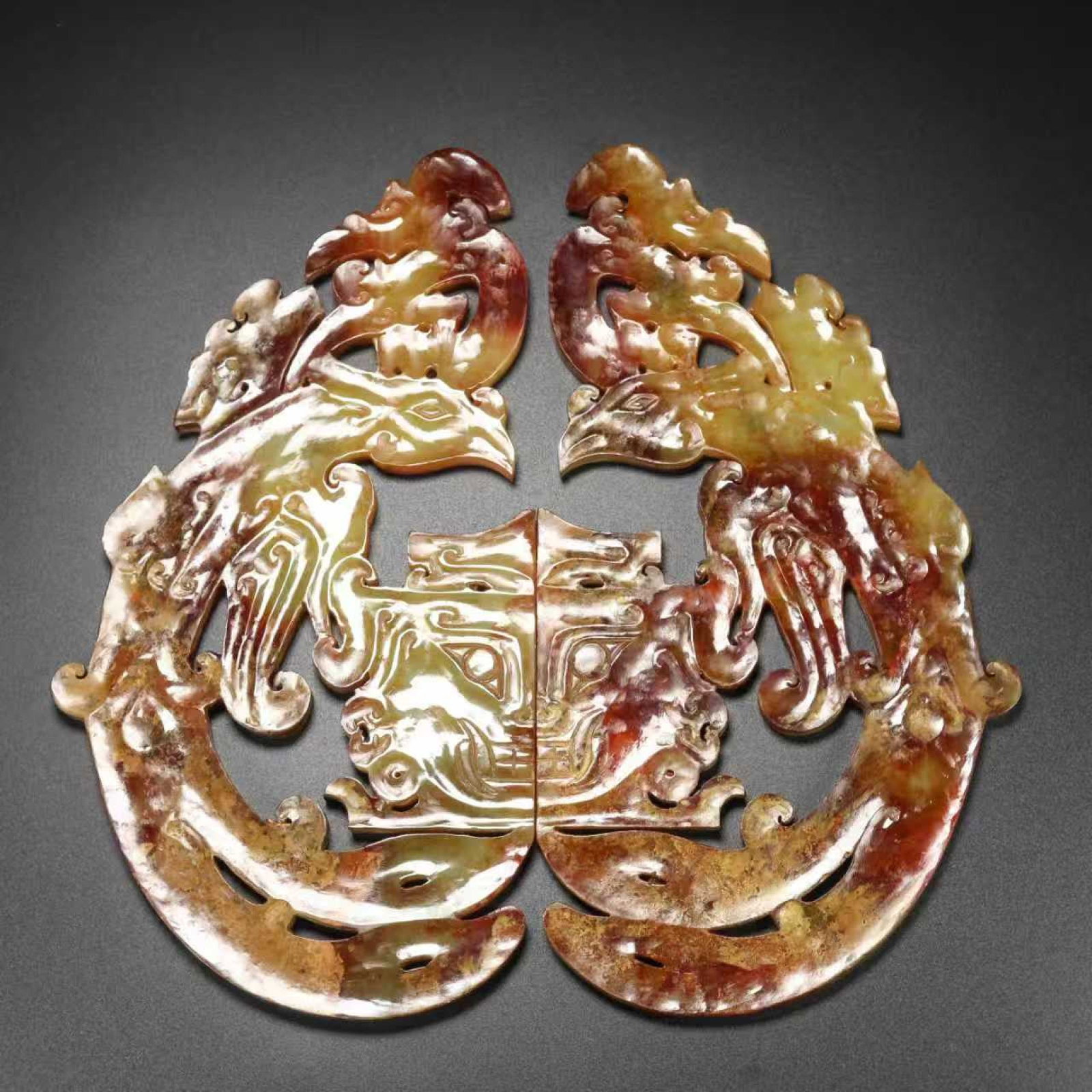 A Pair of Exquisite White Jade Beast-Face and Phoenix Pattern Pendants: A Pair of Exquisite White Jade Beast-Face and Phoenix Pattern Pendants,Qing Dynasty,China,Size:8.7inx8.3inx0.2in,Weight:545g 一对白玉兽面凤纹挂