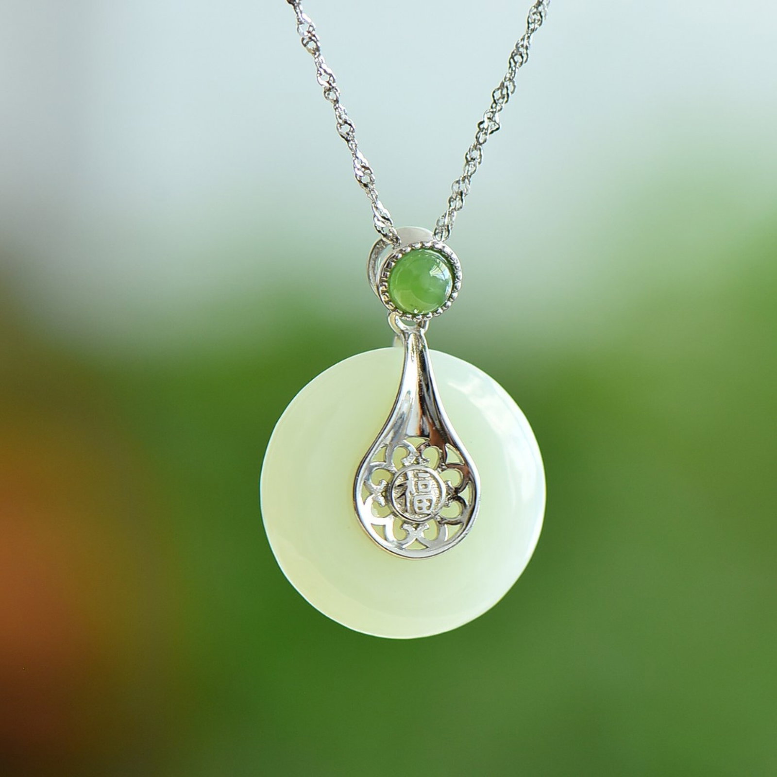 An Exquisite Sterling Silver Inlaid White Jade Pendant: An Exquisite Sterling Silver Inlaid White Jade Pendant,Size:23mmx23mm 纯银镶白玉吊坠