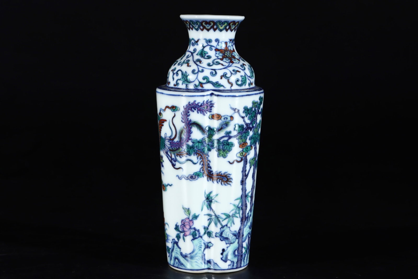 An Exquisite Doucai Phoenix Pattern Lotus Pattern Vase: An Exquisite Doucai Phoenix Pattern Lotus Pattern Vase Qing Dynasty, China Yongzheng Six-character Mark Size:6.3inx2.8in缠枝斗彩凤纹书卷瓶 中