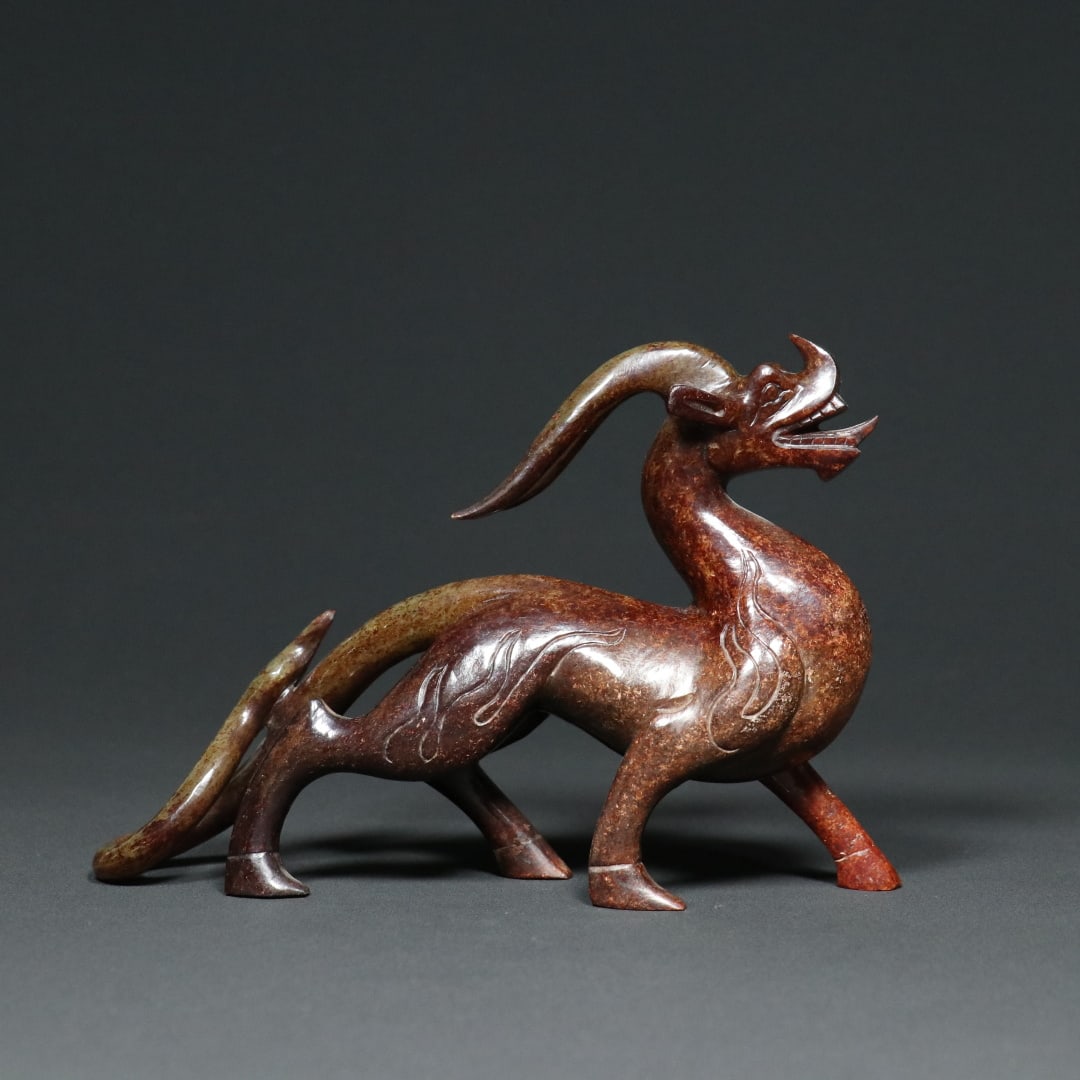 An Exquisite White Jade Dragon Ornament: An Exquisite White Jade Dragon Ornament Han Dynasty, China Size:7.3inx1.8inx5in Weight:523.6g白玉玉龙摆件 中国汉代 Size:18.5cmx4.5cmx12.8cm 