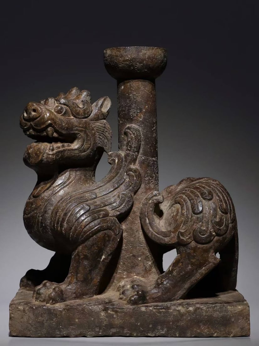 An Exquisite Limestone Auspicious Beast-Shaped Candlestick: An Exquisite Limestone Auspicious Beast-Shaped Candlestick Han Dynasty, China Size:16.1inx13.4inx9.1in青石瑞兽灯台