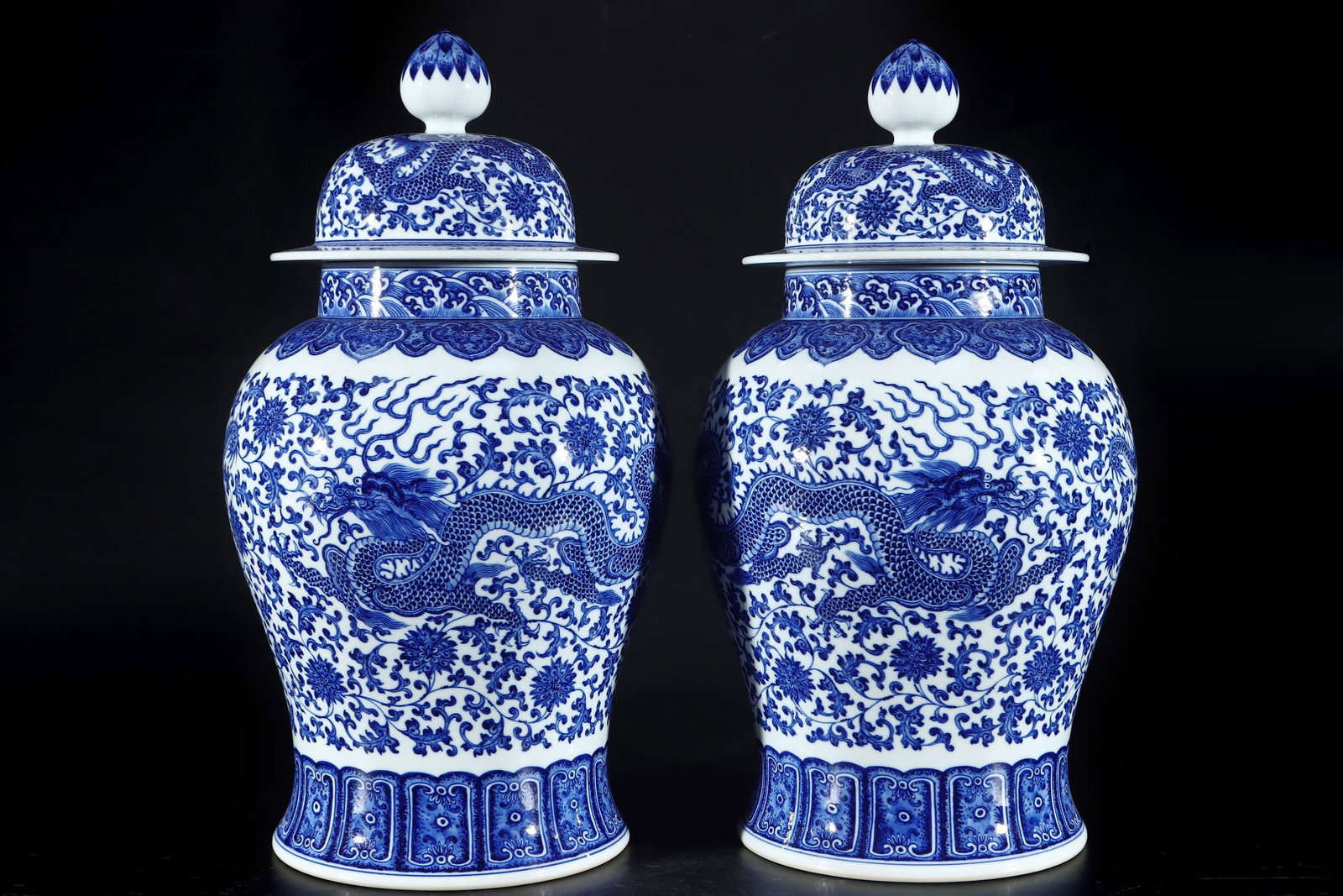 An Exquisite Blue and White Dragon Pattern Lotus Pattern Jar: An Exquisite Blue and White Dragon Pattern Lotus Pattern Jar Qing Dynasty, China Qianlong Six-character Mark Size:21.3inx11in青花龙缠枝纹将军罐 &#
