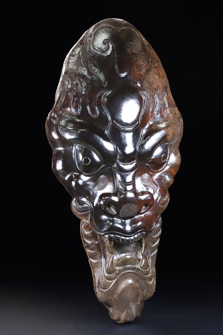 An Exquisite White Jade Beast-Face Pattern Shield: An Exquisite White Jade Beast-Face Pattern Shield Han Dynasty, China Size:18.9inx9.8inx2.3in Weight:5050g白玉兽面盾牌 中国汉代 Size:48cmx25c