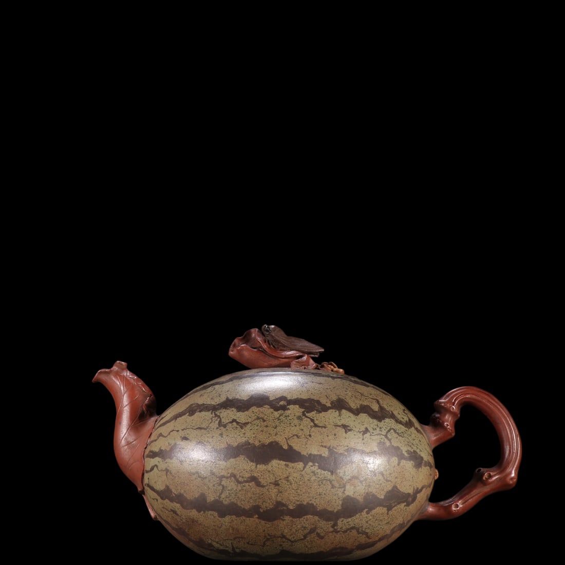 An Exquisite Purple Sands Watermelon-Shaped Teapot: An Exquisite Purple Sands Watermelon-Shaped Teapot Jiang rong Size:4.9inx8.2in紫砂西瓜形茶壶 蒋蓉 Size:12.4cmx20.8cm