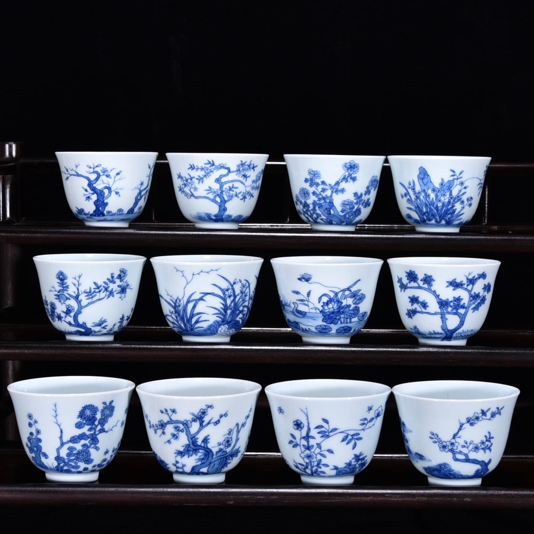 A Set of Fine Blue and White Flower Pattern with poem Cup: A Set of Fine Blue and White Flower Pattern with poem Cup Qing Dynasty, China Kangxi Six-character Mark Size:2inx2.6in青花十二花神杯 中国清&