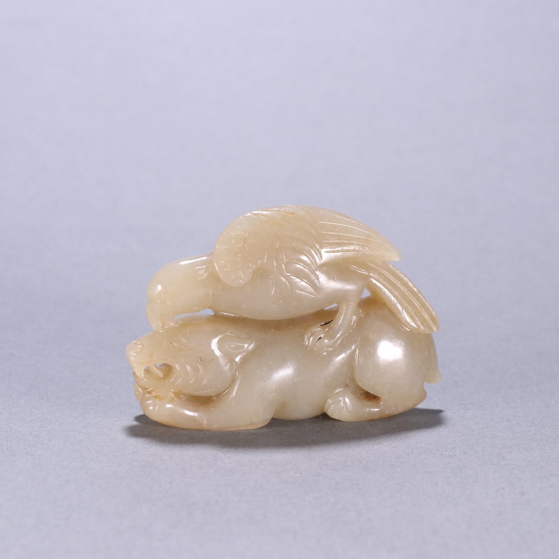 An Exquisite White Jade Bear Hand Piece: An Exquisite White Jade Bear Hand Piece Qing Dynasty, China Size:1.8inx2.7in Weight:82.2g白玉鹰熊把件 中国清代 Size:4.6cmx6.9cm Weight:82.2g