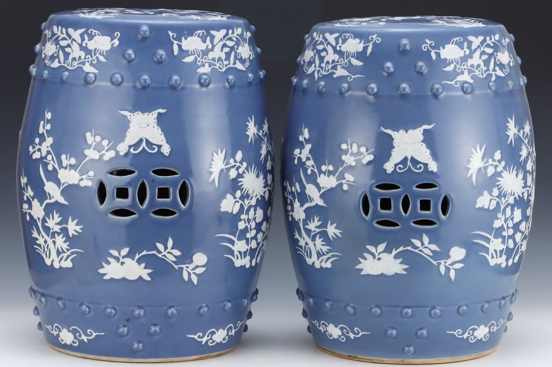 An Exquisite Blue Glazed Flower and Bird Pattern Ornament: An Exquisite Blue Glazed Flower and Bird Pattern Ornament Qing Dynasty, China Size:19.5inx15in蓝釉留白花卉纹绣墩 中国清代 