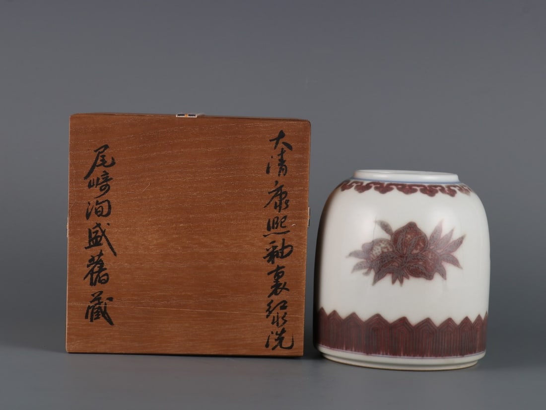 An Exquisite Underglaze-Red Flower and Fruit Pattern Brush Washer: An Exquisite Underglaze-Red Flower and Fruit Pattern Brush Washer Qing Dynasty, China Kangxi Six-character Mark Size:4.9inx2.4in釉里红三多纹水洗