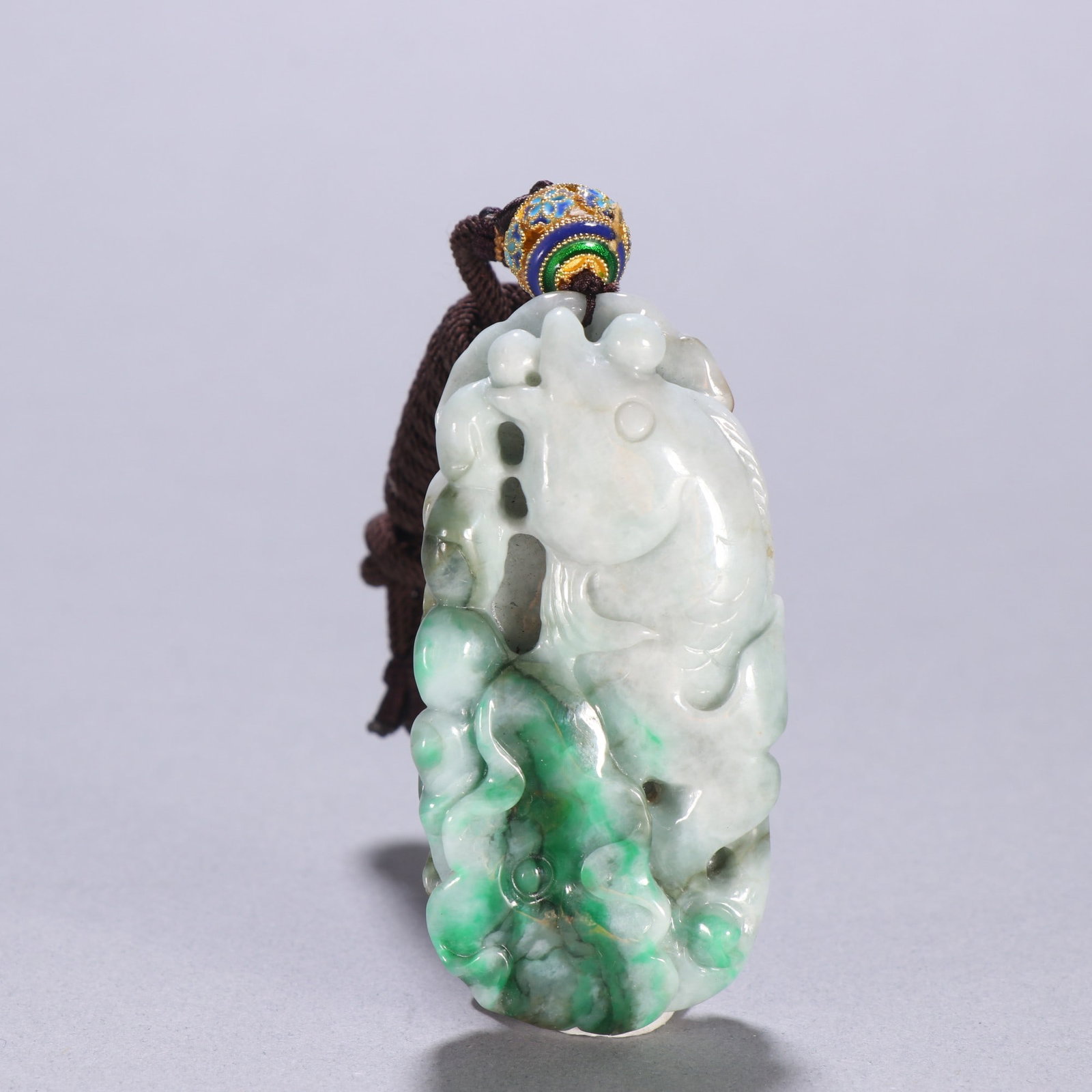 An Exquisite Jadeite Fish Pattern Pendant: An Exquisite Jadeite Fish Pattern Pendant Qing Dynasty, China Size:2.8inx1.4in Weight:81.6g翡翠连年有余挂件 中国清代 Size:7cmx3.