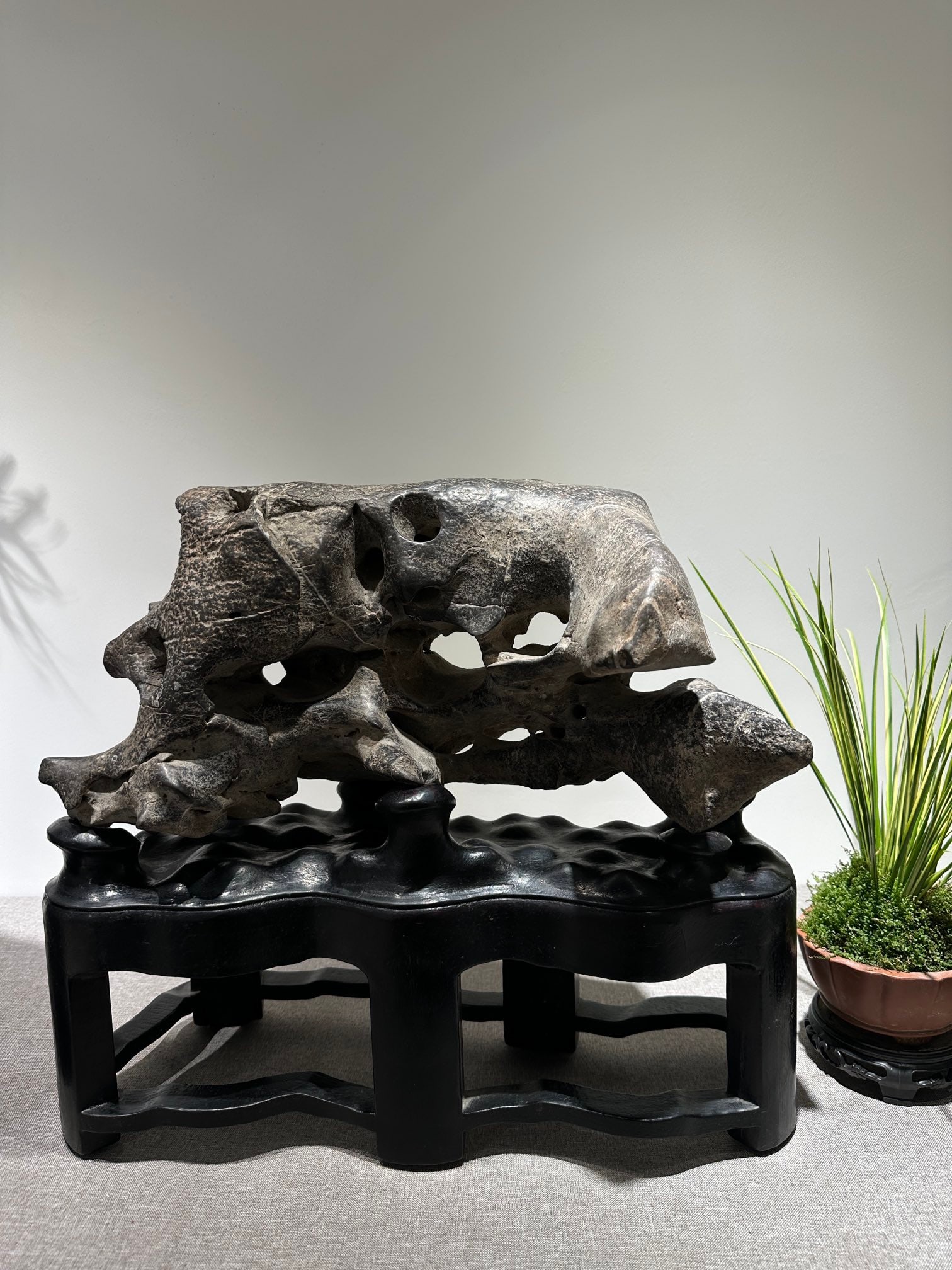 An Exquisite Lingbi Stone Rockery Ornament: An Exquisite Lingbi Stone Rockery Ornament Qing Dynasty, China Size:16.9inx14.6inx7.5in灵璧石雲窟巉巖摆件 中国清代 Size:43