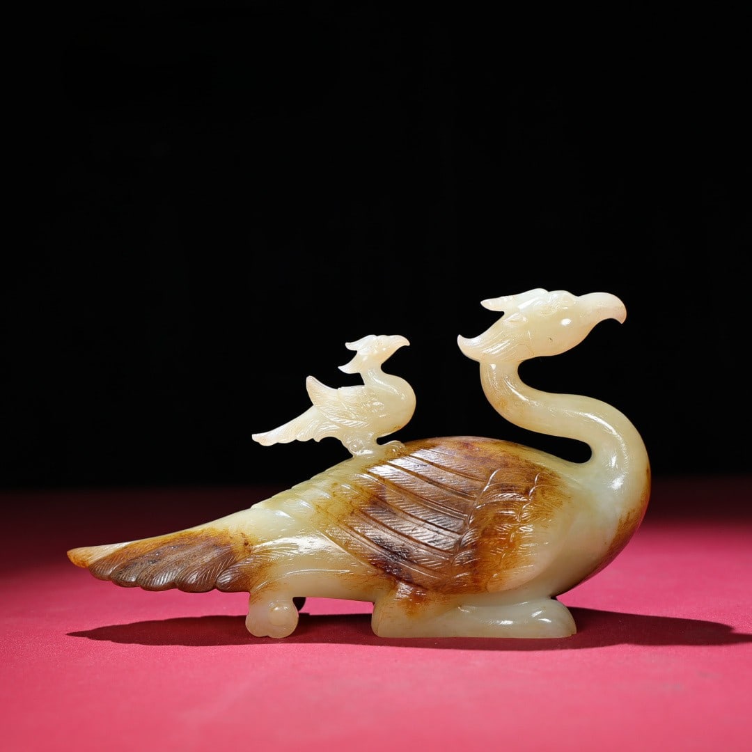 An Exquisite White Jade Phoenix Ornament: An Exquisite White Jade Phoenix Ornament Han Dynasty, China Size:7.4inx2.6inx3.7in Weight:828g白玉凤鸟小摆件 中国汉代