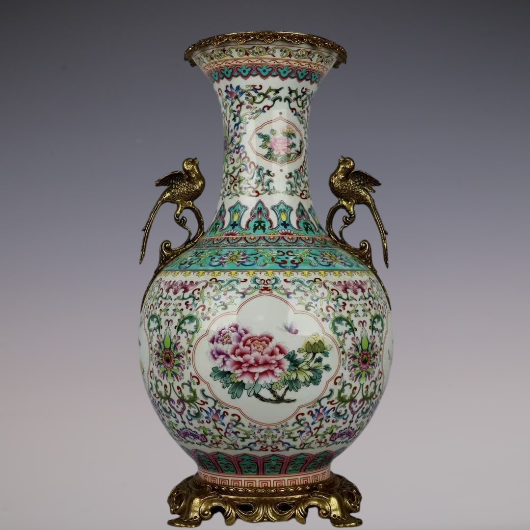 An Exquisite Famille-Rose Inlaid Bronze Lotus Pattern Flower and Butterfly Pattern Double-Ears Vase: An Exquisite Famille-Rose Inlaid Bronze Lotus Pattern Flower and Butterfly Pattern Double-Ears Vase Qing Dynasty, China Qianlong Six-character Mark Size:18.9inx9.4in粉彩开窗
