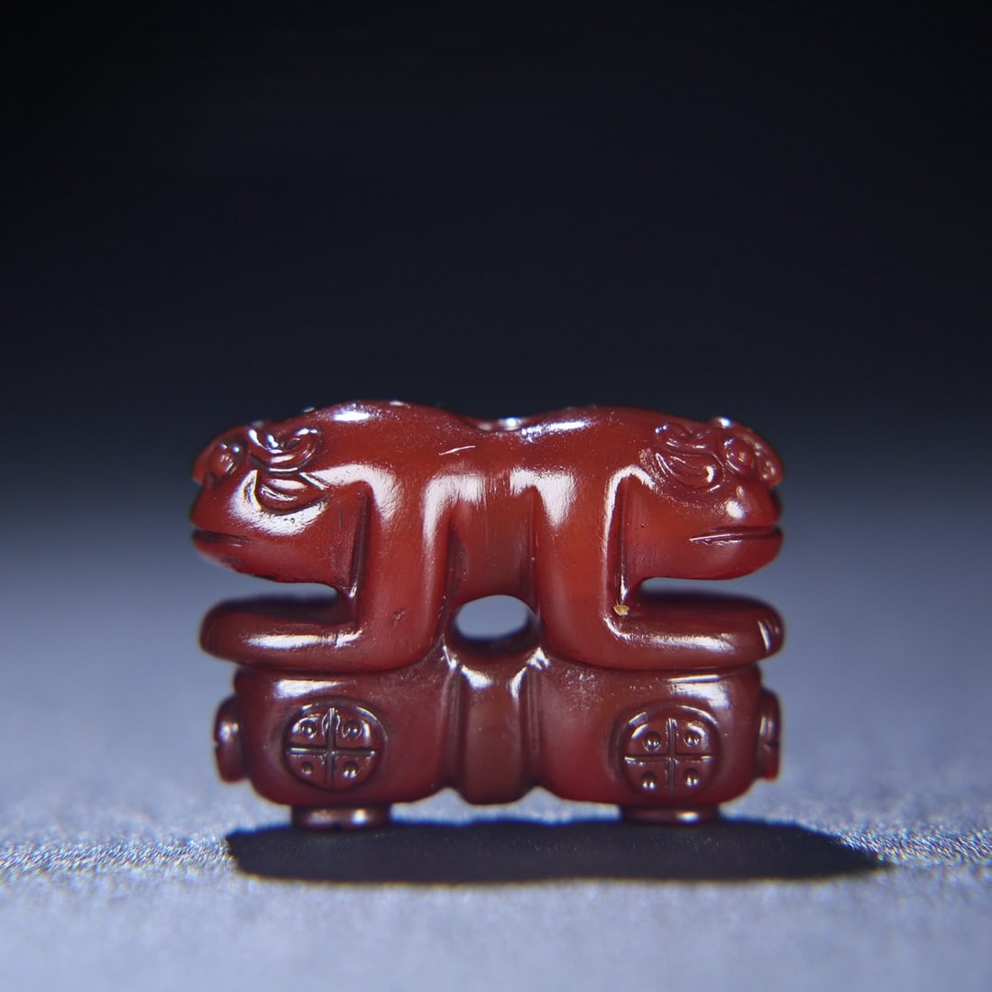 An Exquisite Agate Auspicious Beast Pendant: An Exquisite Agate Auspicious Beast Pendant Han Dynasty, China Size:1.5inx1.1inx0.6in Weight:23g玛瑙护法挂饰 中国汉代 Size:3.8cmx2.7cmx1.4cm