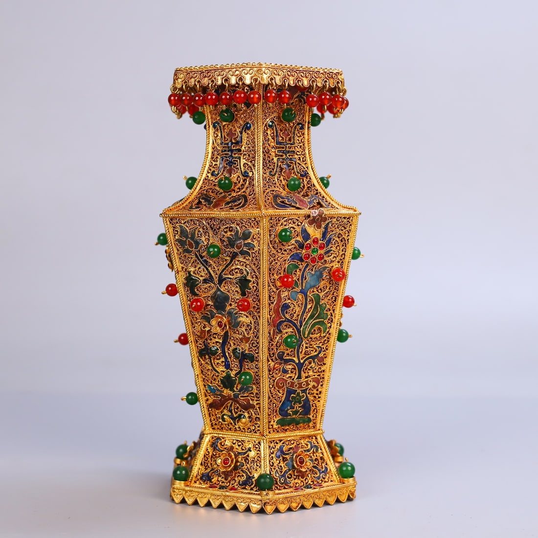 An Exquisite Gilt Bronze Inlaid Gems Flower Pattern Vase: An Exquisite Gilt Bronze Inlaid Gems Flower Pattern Vase Qing Dynasty, China Qianlong Four-character Mark Size:8.3inx4.3in
