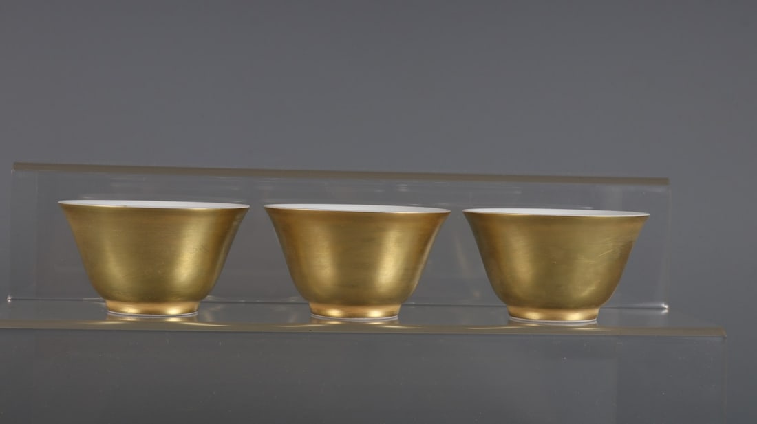 A Set of Fine Famille-Rose Flower and Fruit Pattern Cup: A Set of Fine Famille-Rose Flower and Fruit Pattern Cup Qing Dynasty, China Yongzheng Six-character Mark Size:1.8inx3.1in鎏金内粉彩三多纹杯一