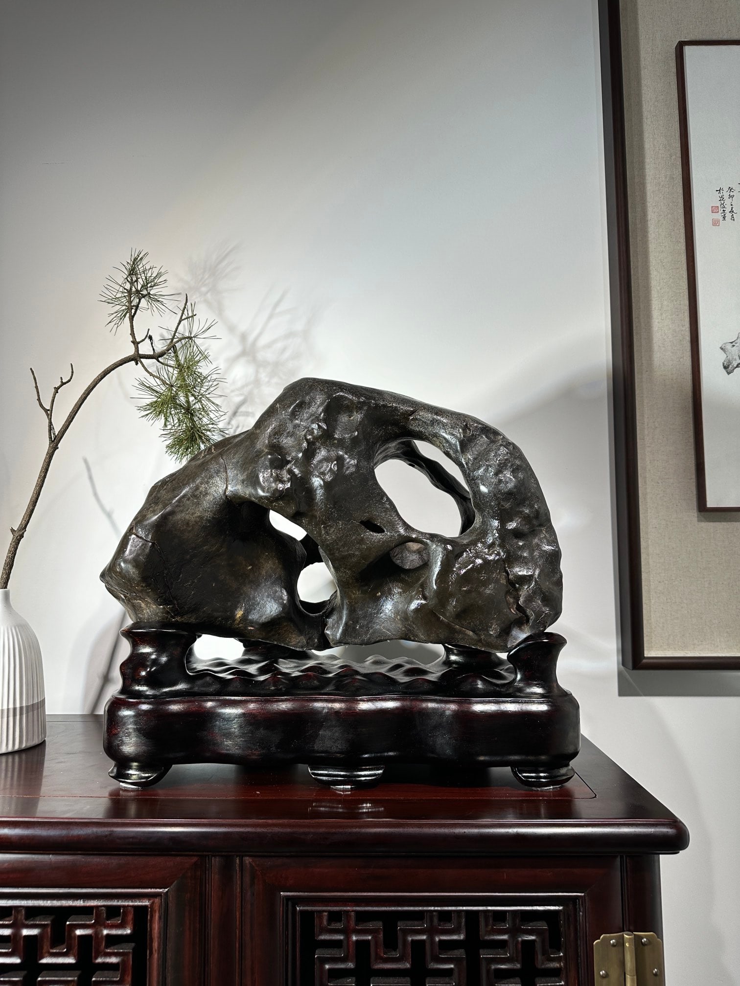 An Exquisite Taihu Stone Ornament: An Exquisite Taihu Stone Ornament Qing Dynasty, China Size:17.7inx15.7inx9.1in太湖石摆件 中国清代 Size:45cmx40cmx23cm