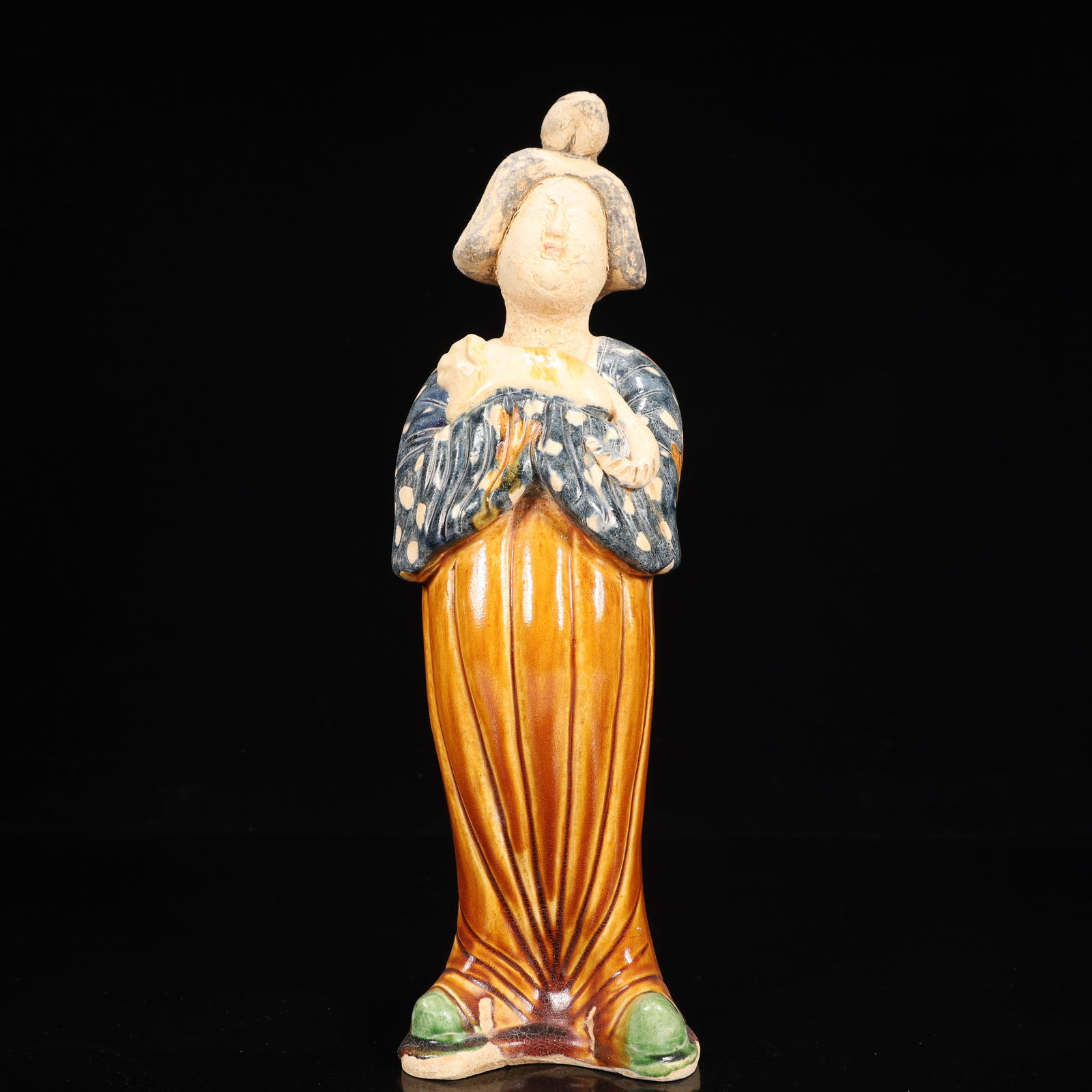A Rare Tang Tri-Color Glazed Pottery Woman Ornament: A Rare Tang Tri-Color Glazed Pottery Woman Ornament,Tang Dynasty, China,Chinese Tang Tri-colored Pottery, or Tang Sancai, flourished during the Tang Dynasty (618–907 AD). It's renowned for its v