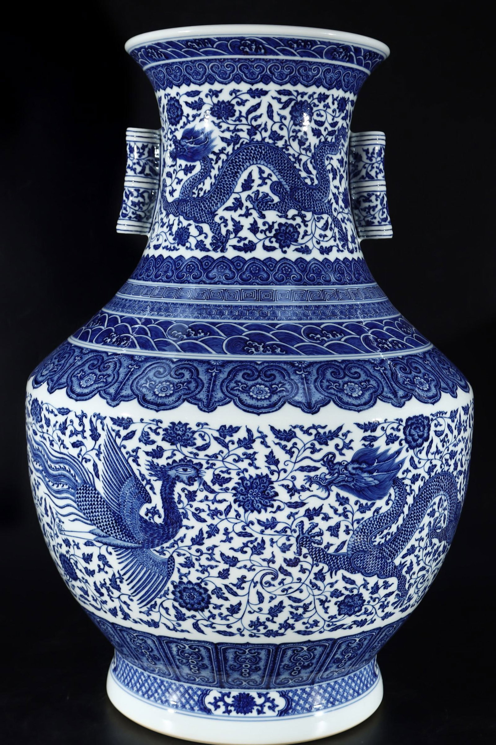 A Huge Blue and White Dragon and Phoenix Pattern Double-Ears Vase: A Huge Blue and White Dragon and Phoenix Pattern Double-Ears Vase,Qing Dynasty,China,Qianlong Six-character Mark,Size:31.1inx20.5in 青花龙凤纹双耳瓶