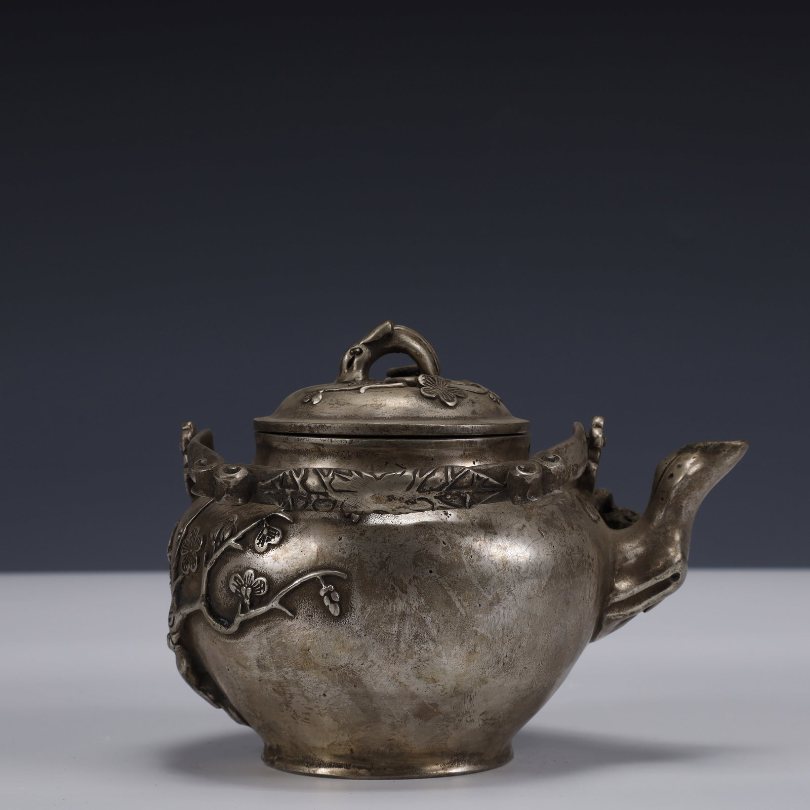 An Exquisite Silver-Plated Bronze Plum blossom Pattern Ewer: An Exquisite Silver-Plated Bronze Plum blossom Pattern Ewer,The Republic of China,Size:6.7inx5.1inx5.9in,Weight:950g 铜镀银梅花纹执壶,中国&#
