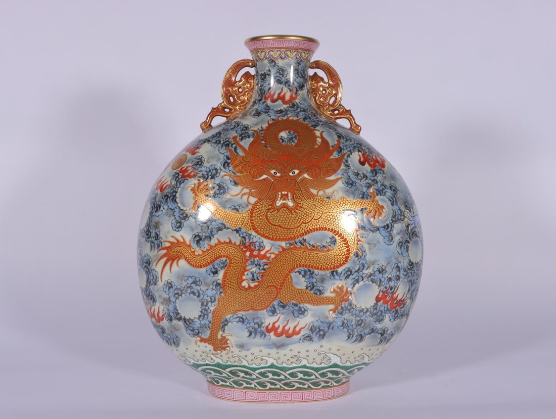 A Rare Famille-Rose Painted Gold Auspicious Cloud and Dragon Pattern Double-Ears Vase: A Rare Famille-Rose Painted Gold Auspicious Cloud and Dragon Pattern Double-Ears Vase,Qing Dynasty,China,Qianlong Six-character Mark,Size:11.9inx9.4in
