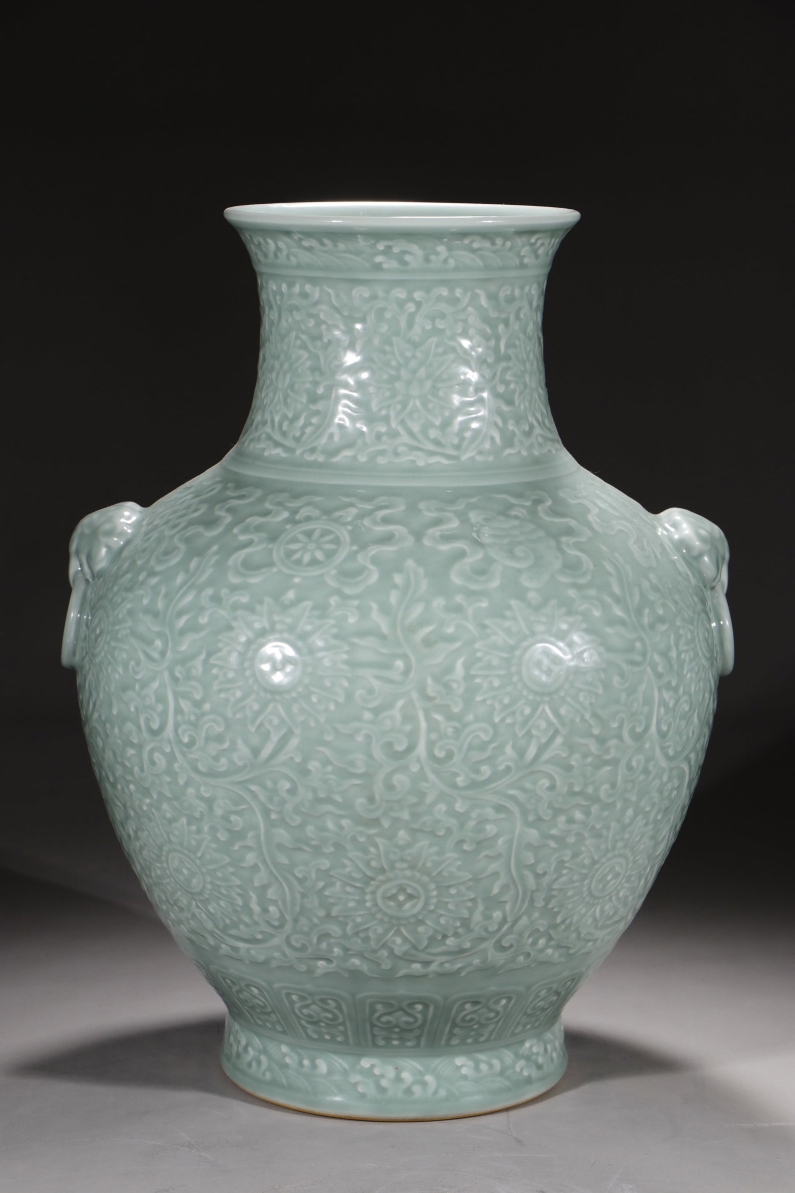 A Huge Celadon Glazed Lotus and Eight Treasures Pattern Beast-Ears Vase: A Huge Celadon Glazed Lotus and Eight Treasures Pattern Beast-Ears Vase,Qing Dynasty,China,Qianlong Six-character Mark,Size:21.5in 粉青釉缠枝莲八宝ń