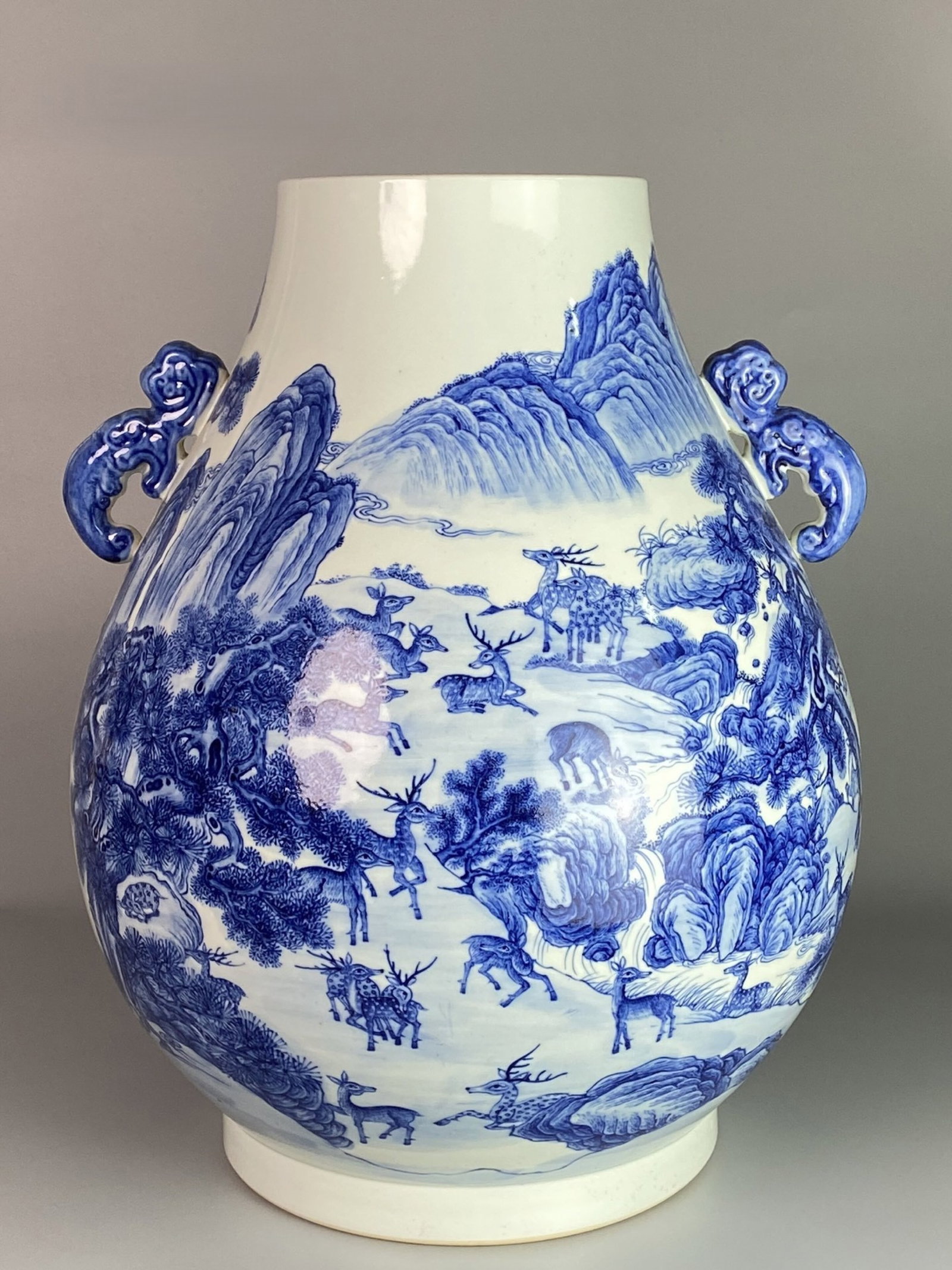 A Huge Blue and White Deer Pattern Double-Ears Vase: A Huge Blue and White Deer Pattern Double-Ears Vase,Qing Dynasty,China,Qianlong Six-character Mark,Size:18.5inx16.1in 青花鹿纹双耳瓶,中国清&