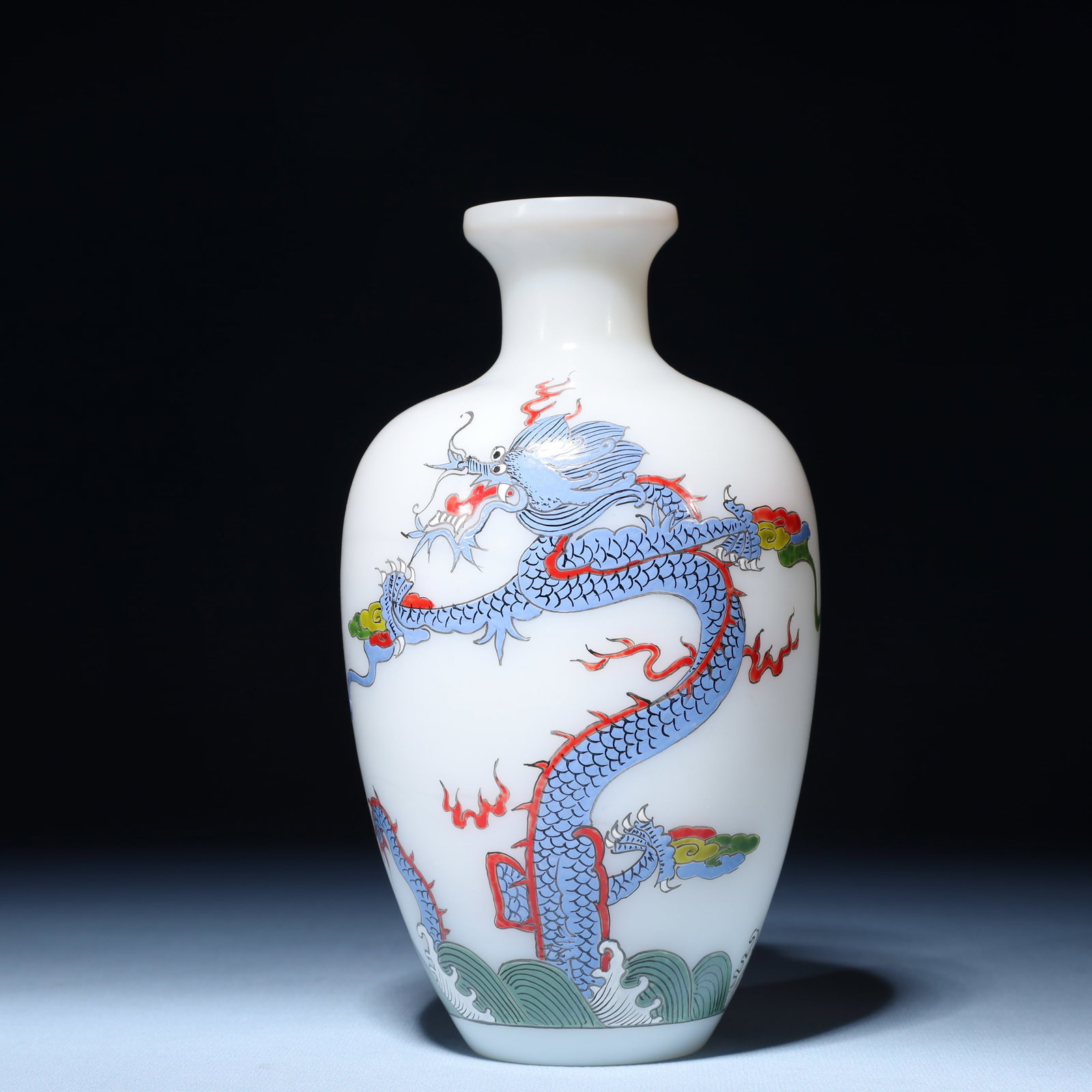 An Exquisite Glass Seawater and Dragon Pattern Vase: An Exquisite Glass Seawater and Dragon Pattern Vase,Qing Dynasty,China,Qianlong Four-character Mark,Size:4.3inx7.9in,Weight:597g 琉璃海水龙纹瓶,中ࢲ