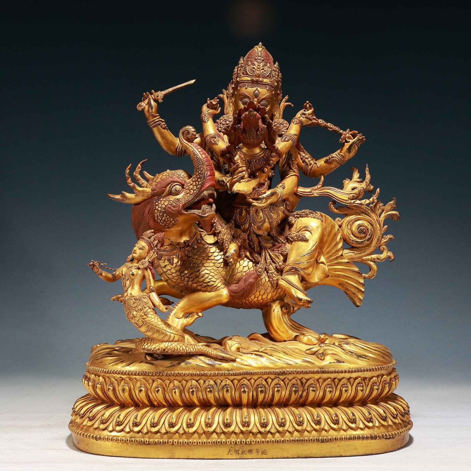 A Solemn Gilt Bronze Statue of Vajra Rides the Dragon: A Solemn Gilt Bronze Statue of Vajra Rides the Dragon,Ming Dynasty,China,Yongle Six-character Mark,Size:13.8inx7.5inx17.7in,Weight:19100g 铜鎏金骑龙金刚ࠔ