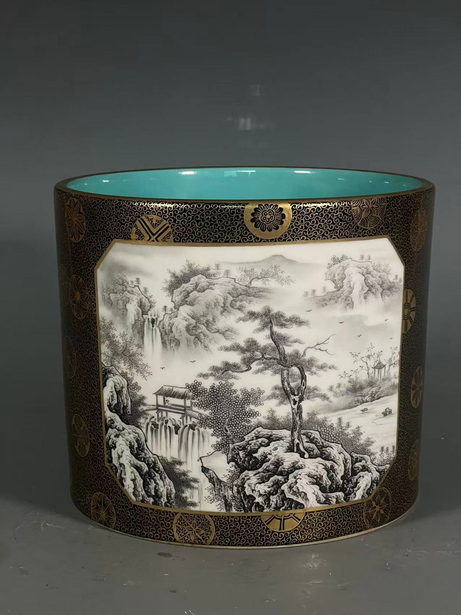 An Exquisite Ugyen Glazed Ink Color Painted Gold Landscape Pattern Brush Pot: An Exquisite Ugyen Glazed Ink Color Painted Gold Landscape Pattern Brush Pot,Qing Dynasty,China,Qianlong Six-character Mark,Size:6.5inx7.5in 乌金釉墨彩描金