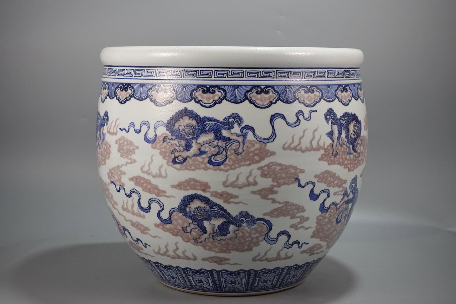 A Huge Blue and White Underglaze-Red Lion Pattern Vat: A Huge Blue and White Underglaze-Red Lion Pattern Vat,Qing Dynasty,China,Size:14.2inx15.4in 青花釉里红狮子纹缸,中国清代