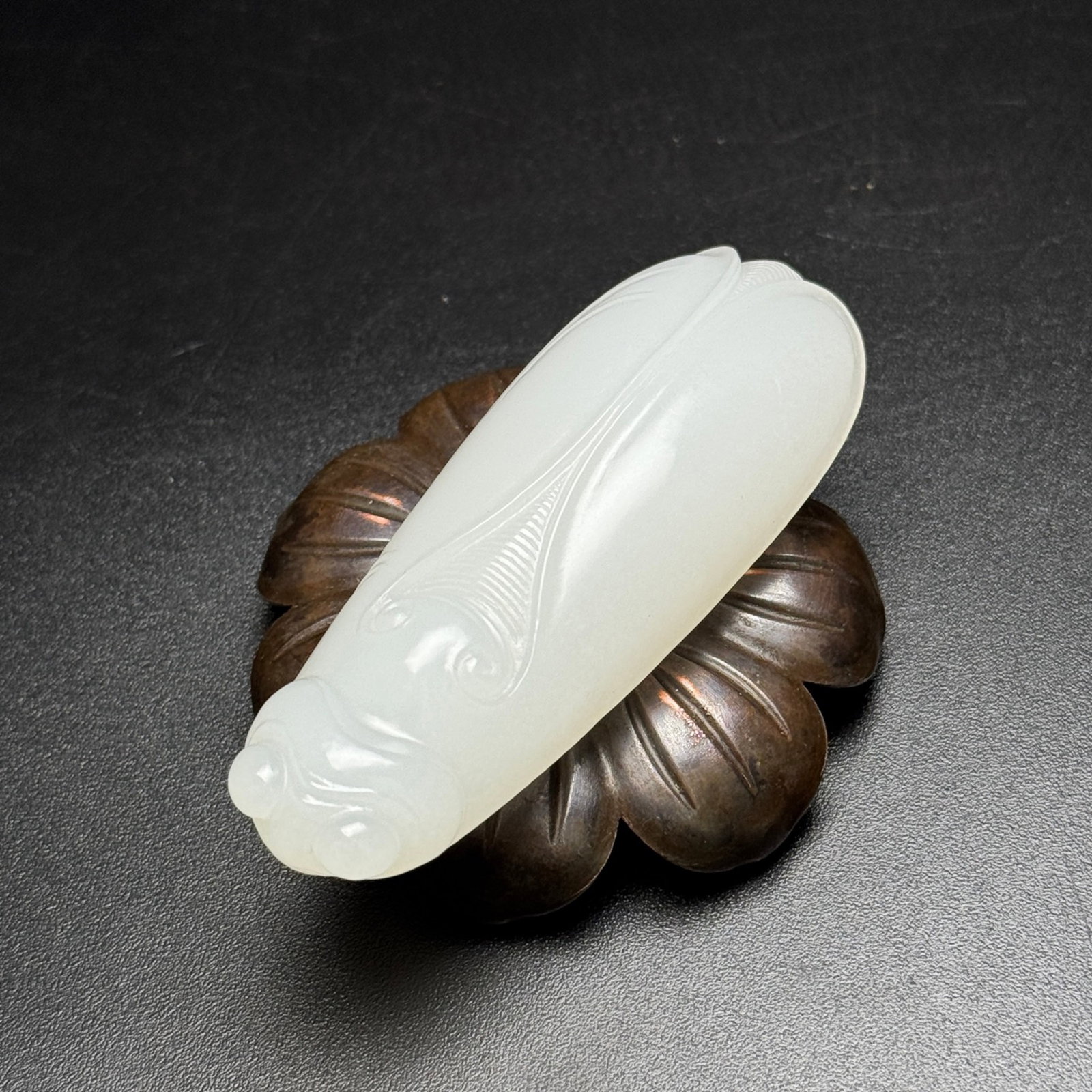An Exquisite White Jade Cicada Ornament: An Exquisite White Jade Cicada Ornament,Qing Dynasty,China,Size:3.1inx1.2inx0.7in,Weight:69g 白玉蝉摆件,中国清代