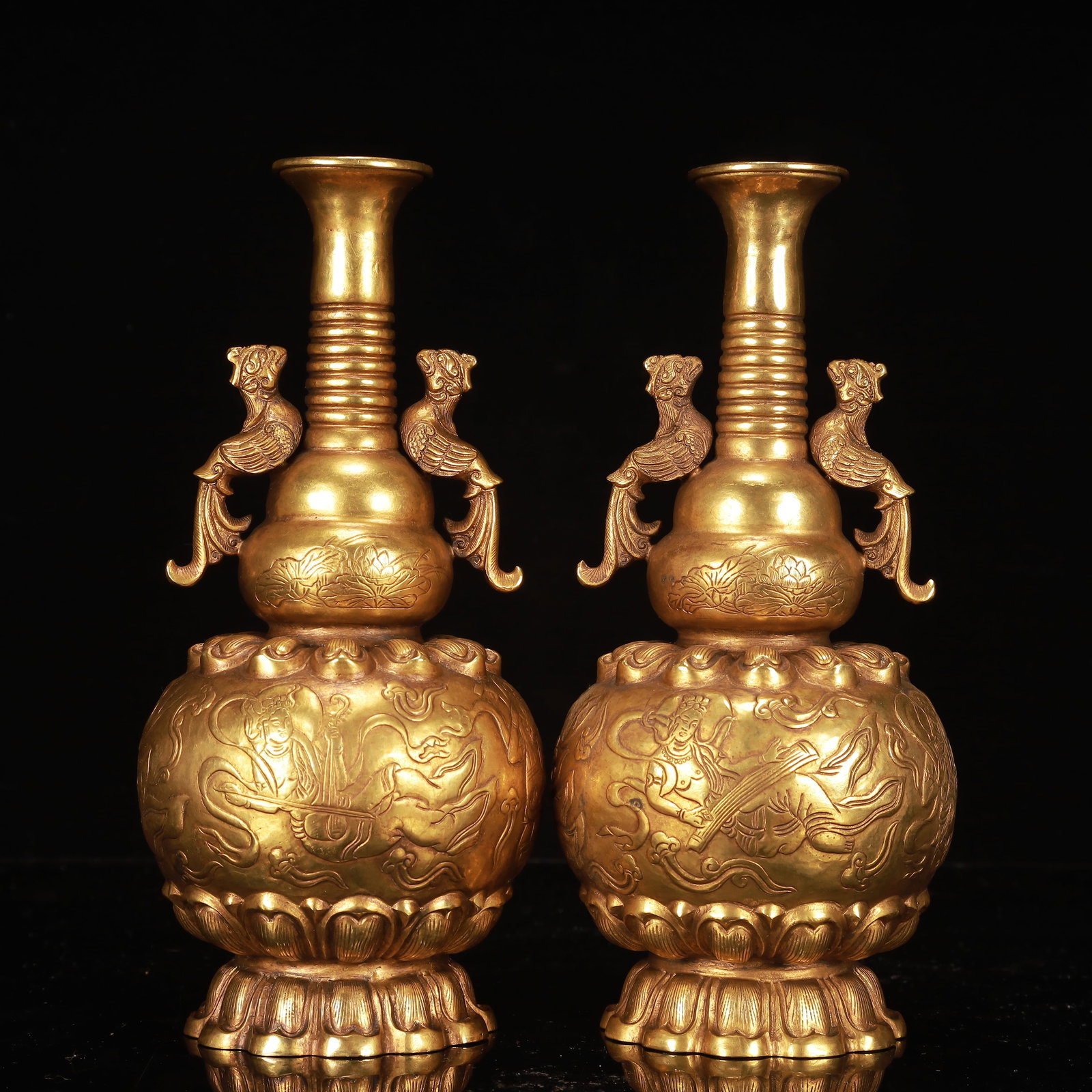 A Pair of Exquisite Gilt Bronze Figure Pattern Phoenix-Ears Gourd-Shaped Vases: A Pair of Exquisite Gilt Bronze Figure Pattern Phoenix-Ears Gourd-Shaped Vases,Qing Dynasty, China,Size:5.1inx9.4in,Weight:1950g