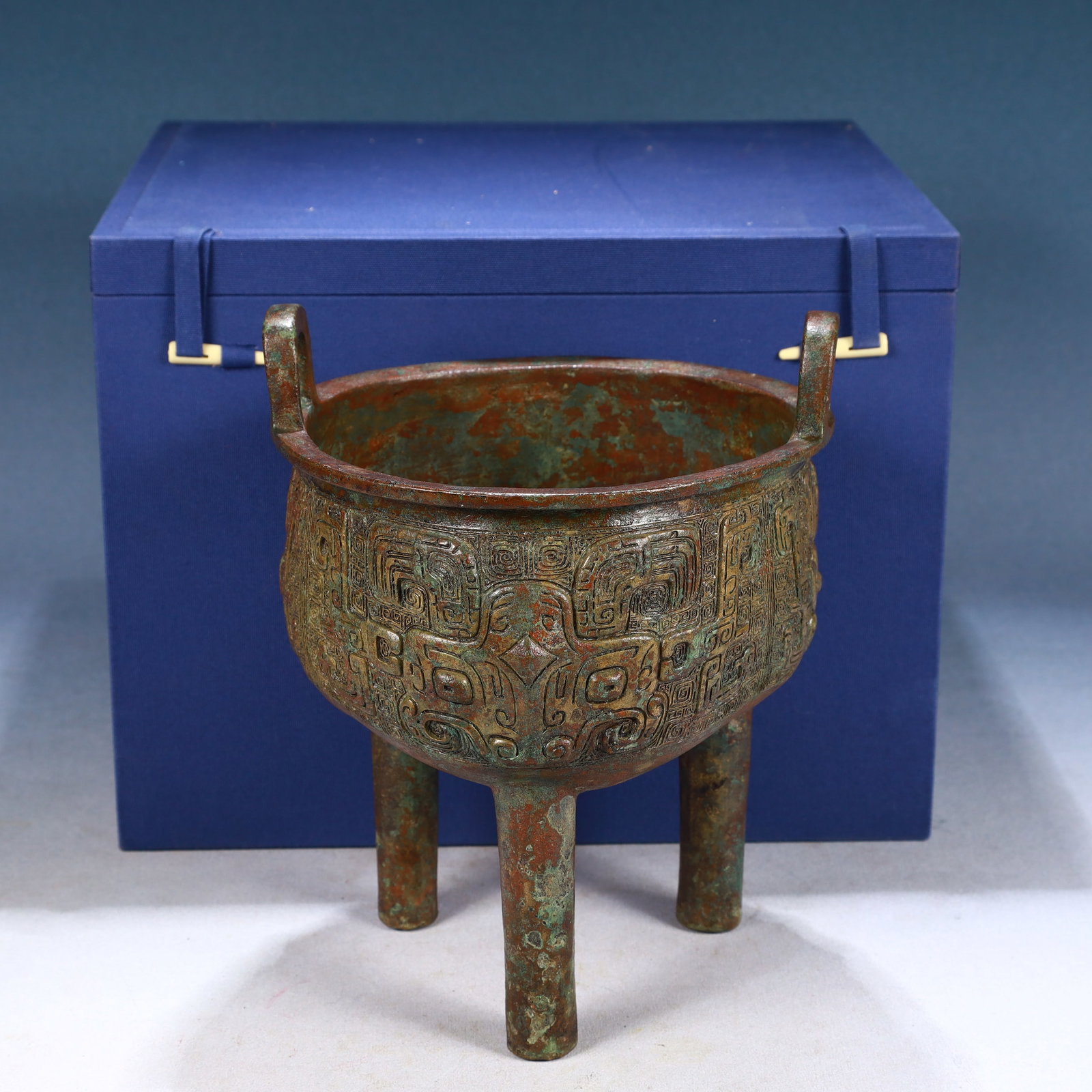 An Archaic Bronze Beast-Face Pattern Double-Ears and Tripod Censer: An Archaic Bronze Beast-Face Pattern Double-Ears and Tripod Censer,Qing Dynasty, China,Size:7.5inx9.4in,Weight:2750g 青铜兽面纹双耳三足香