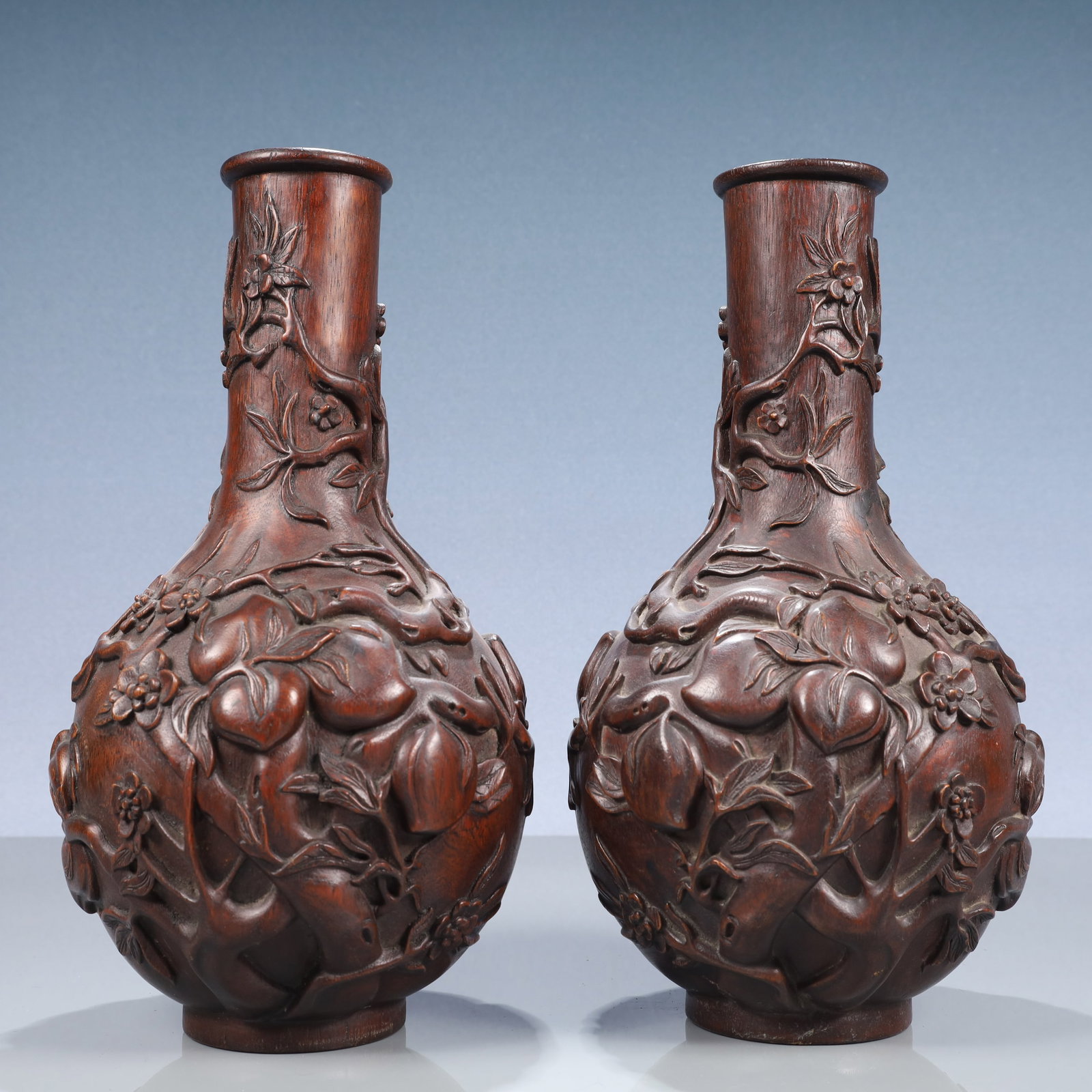 A Pair of Rare Eaglewood Peach Pattern Vases: A Pair of Rare Eaglewood Peach Pattern Vases,Qing Dynasty, China,Size:5.9inx12.2in,Weight:1350g 一对沉香木桃纹瓶,中国清代