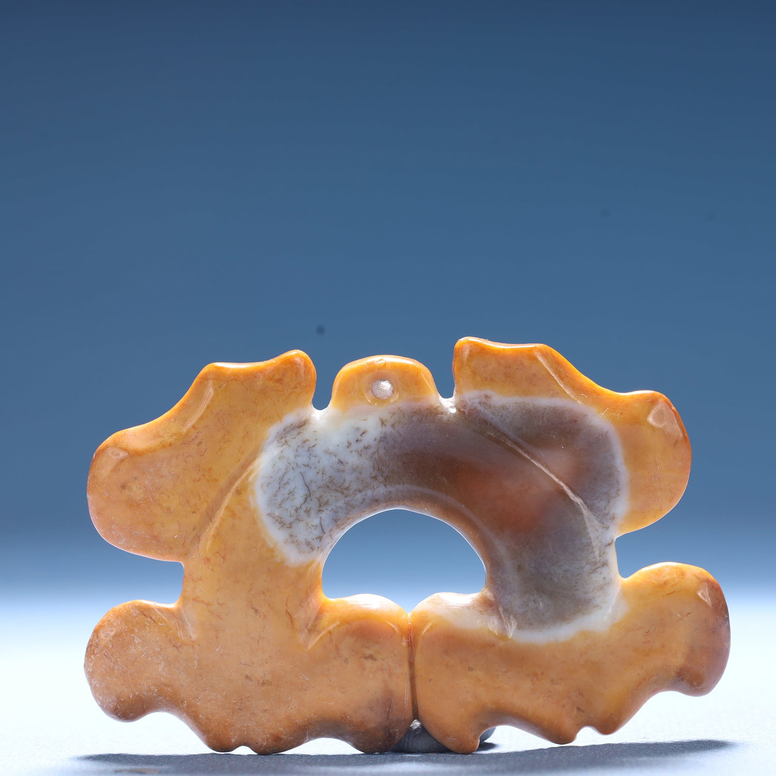 An Archaic Hongshan Culture Yellow Jade Ornament: An Archaic Hongshan Culture Yellow Jade Ornament,Ancient Time,China,Size:3inx2.7inx1.9in,Weight:40.5g 红山文化黄玉摆件,中国新石&