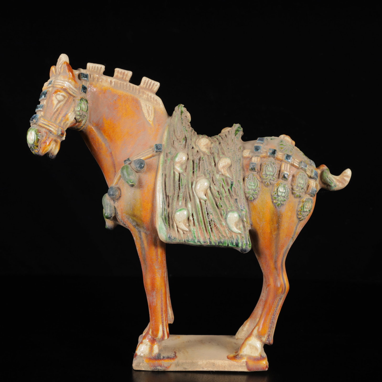 An Exquisite Tang Tri-Color Glazed Pottery Horse Ornament: An Exquisite Tang Tri-Color Glazed Pottery Horse Ornament,Tang Dynasty,China,Size:9.4inx3.1inx9.1in,Weight:940g 唐三彩马摆件,中国唐代