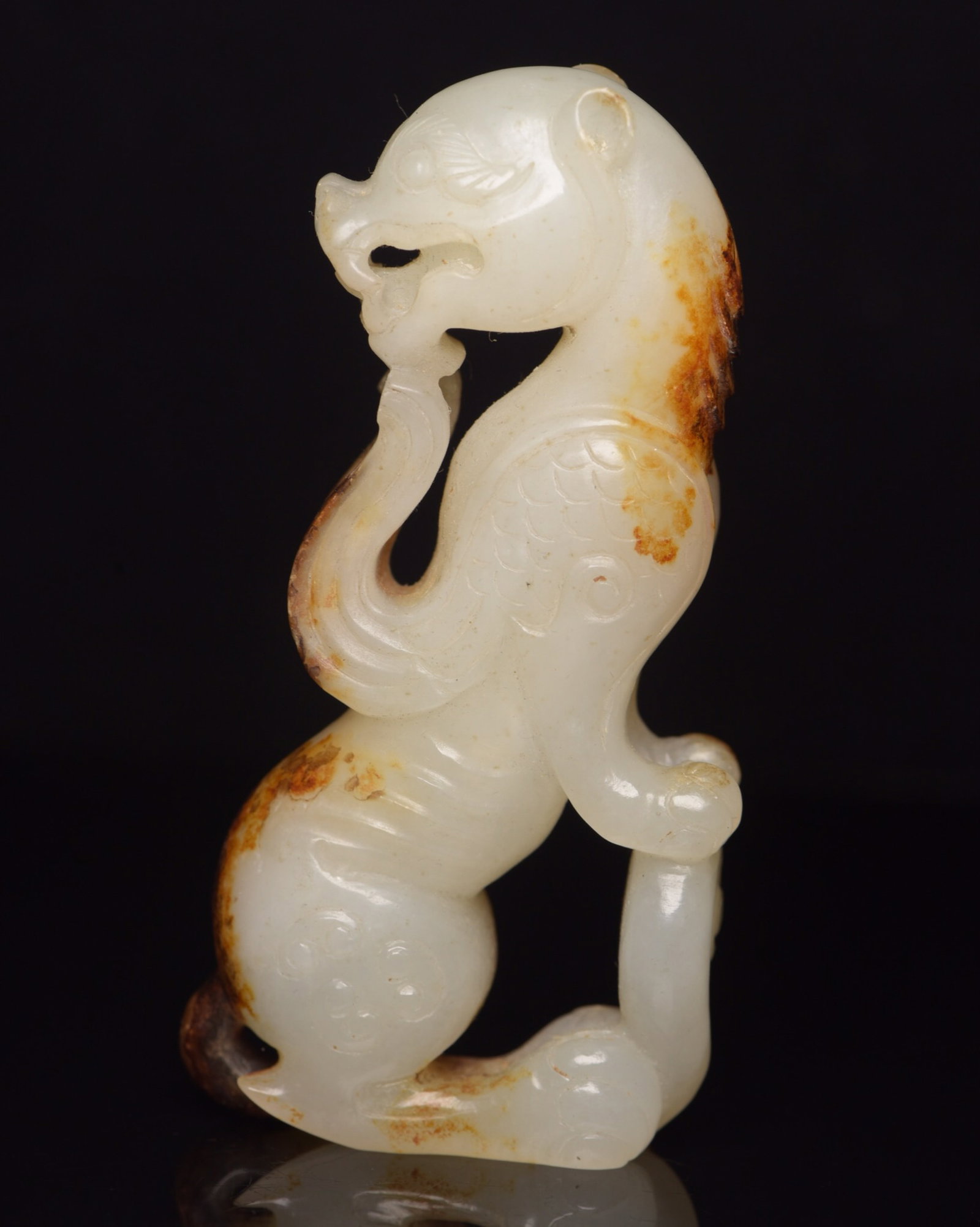 An Exquisite White Jade Beast Ornament: An Exquisite White Jade Beast Ornament,Qing Dynasty,China,Size:3.8inx1.9inx0.8in,Weight:132g 白玉兽摆件,中国清代