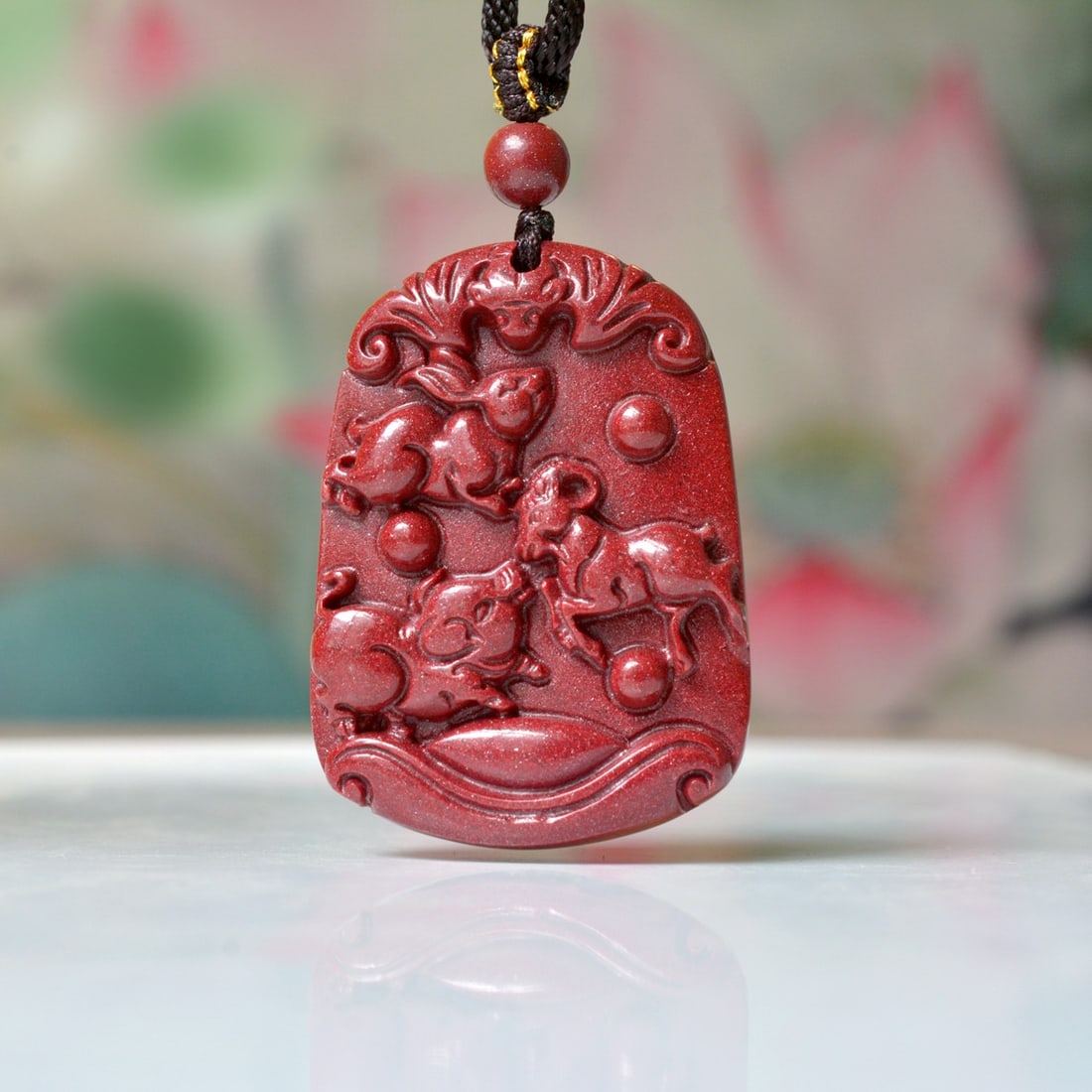 An Exquisite Cinnabar Animal Pattern Pendant: An Exquisite Cinnabar Animal Pattern Pendant,Size:1.2inx1.7in,Weight:31.7g 朱砂动物纹挂件