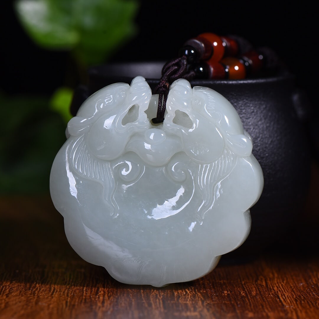 An Exquisite White Jade Dragon Pattern Pendant: An Exquisite White Jade Dragon Pattern Pendant,Size: 2inx2.1in (寓意)吉祥如意,招财辟邪 白玉龙纹挂件