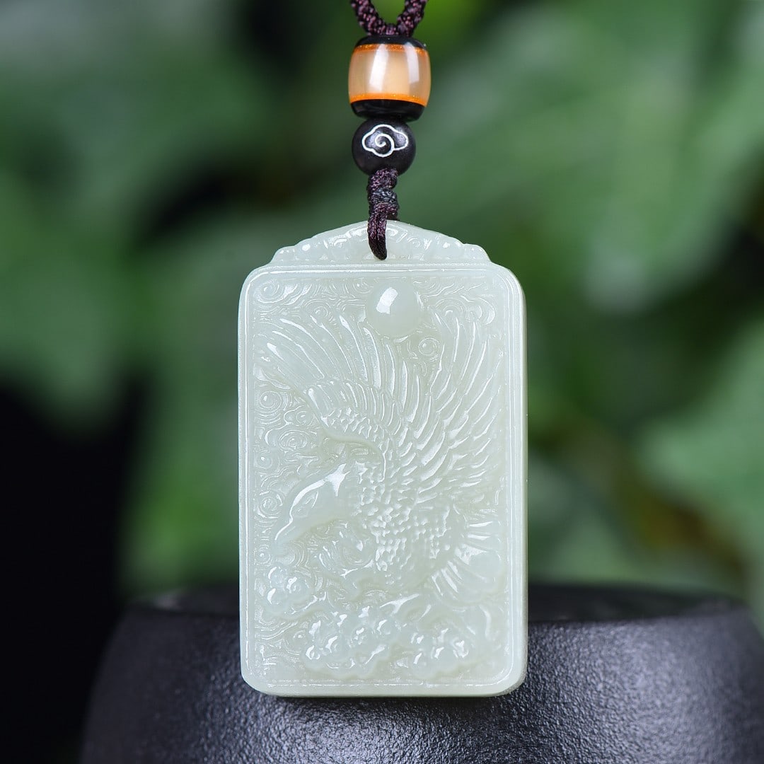 An Exquisite White Jade Eagle Pattern Pendant: An Exquisite White Jade Eagle Pattern Pendant,Size:1.1inx1.8in 白玉鹰纹挂件